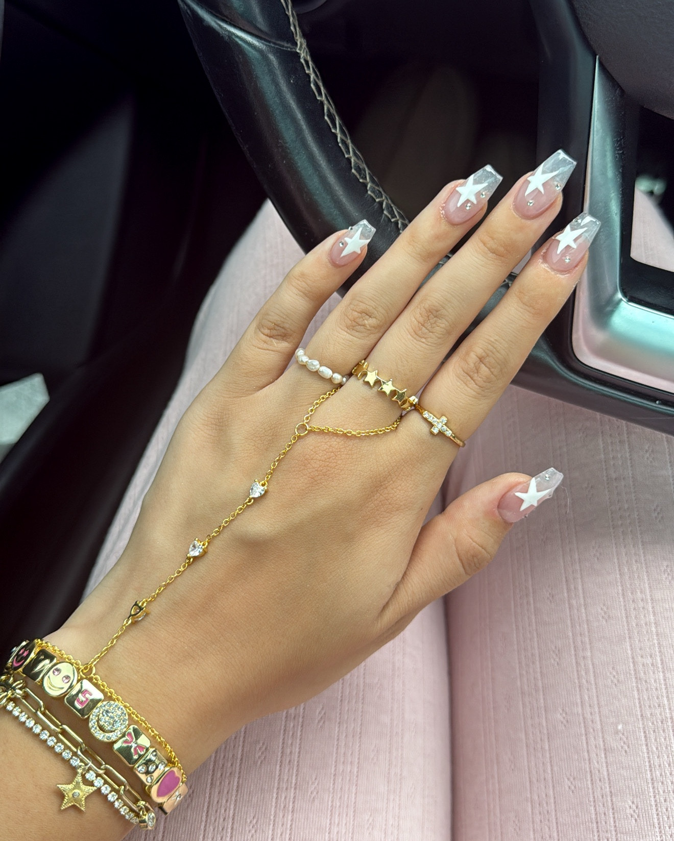all rings & handchain: evry jewels! pink/gold bracelet: lisa gozlan 