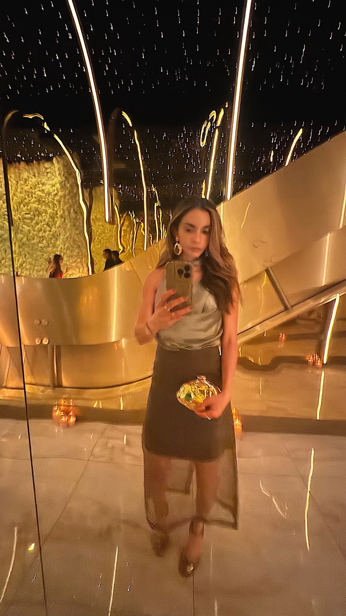 Olive green monochromatic moment ✨
Satin drape top paired with a sheer overlay skirt and metallic accents — elevated, minimal, and quietly luxurious. Perfect for an elegant night out.

Shop the full look below 🤍