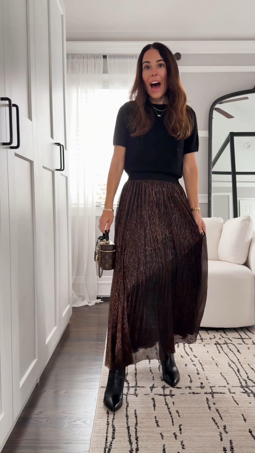This is my favorite way to do holiday dressing without feeling overdone ✨ A simple black sweater tee paired with a shimmery pleated skirt is comfy, flattering, and so chic for dinners, parties, or date night. Easy to dress up or down with boots or heels.
@nordstrom #nordstrompartner 

#LTKSeasonal #LTKHoliday #LTKOver40