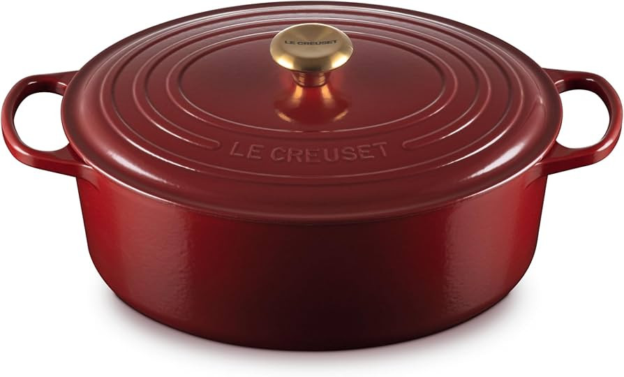 Le Creuset Enameled Cast Iron Signature Oval Dutch Oven, 8 qt., Rhone with Gold Knob | Amazon (US)
