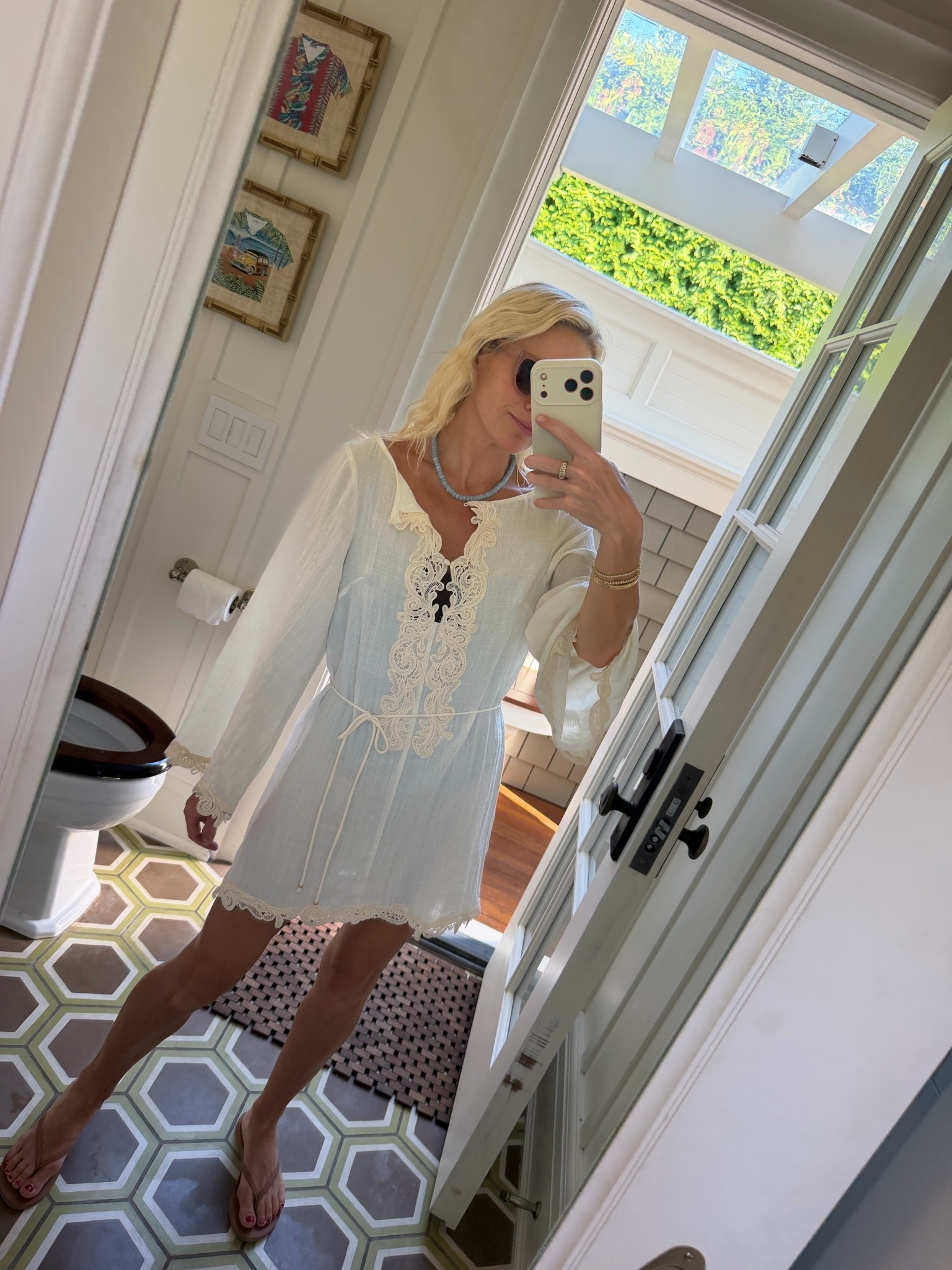 H&M cream lace trim cover up dress paired with Amazon beaded necklace
Flip flops are malvados in the color sinead

#LTKSaleAlert