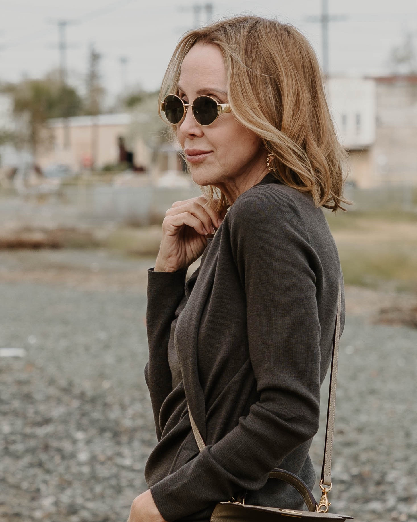 This sweater has a tie around the neck that creates such a beautiful draping situation comes in a couple of colors. Trust me you want it in all it’s the most flattering sweater.

#LTKStyleTip