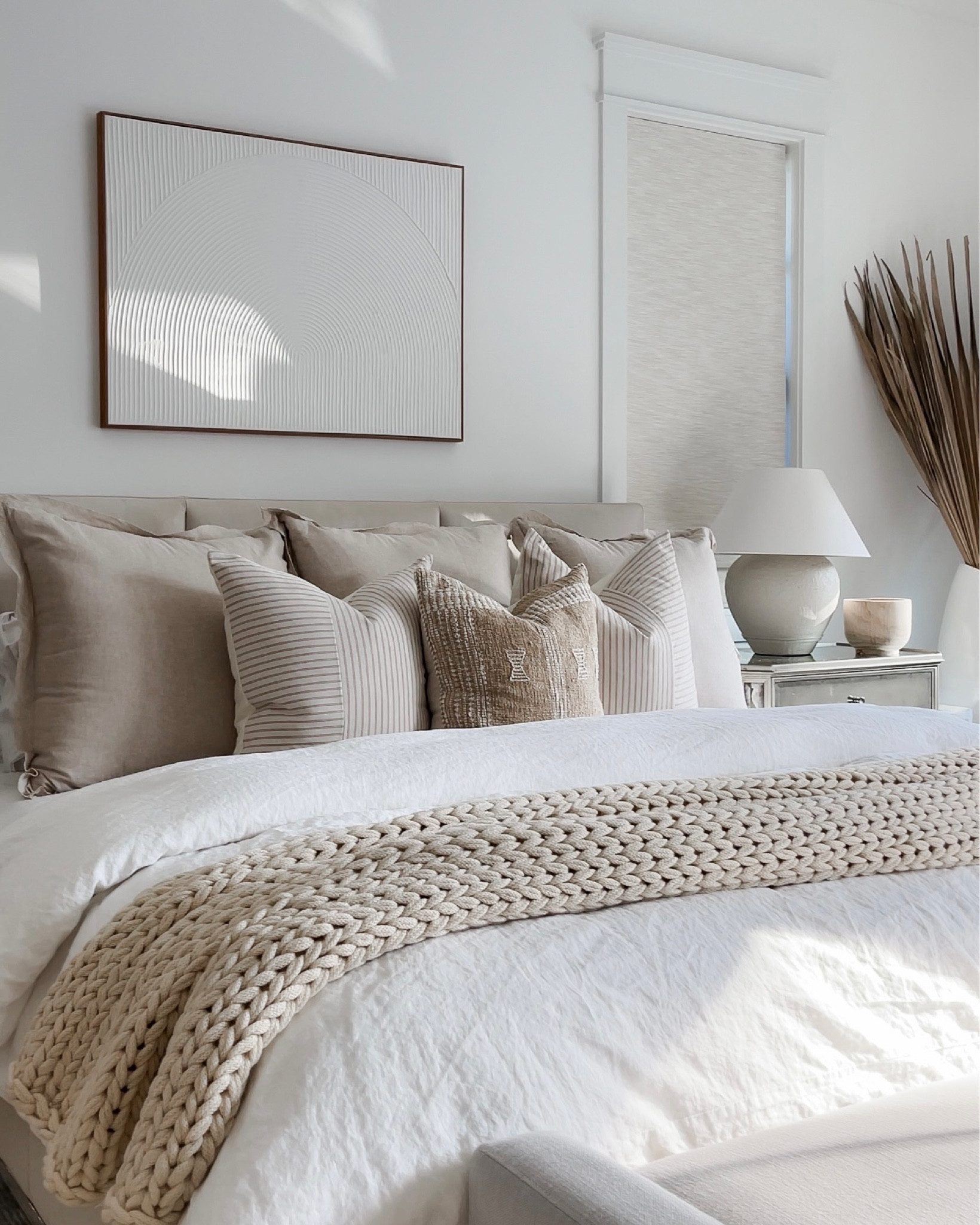 Neutral bedroom decor! Se fresh & airy! 
Pillows, throw blanket, lamps, art, linen duvet cover, bowl 