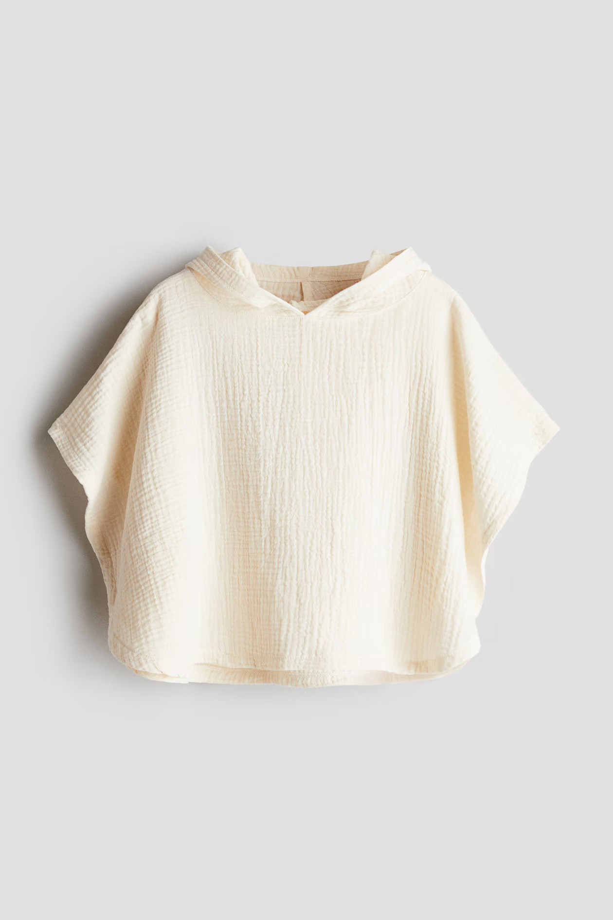 Cotton muslin poncho towel | H&M (UK, MY, IN, SG, PH, TW, HK)