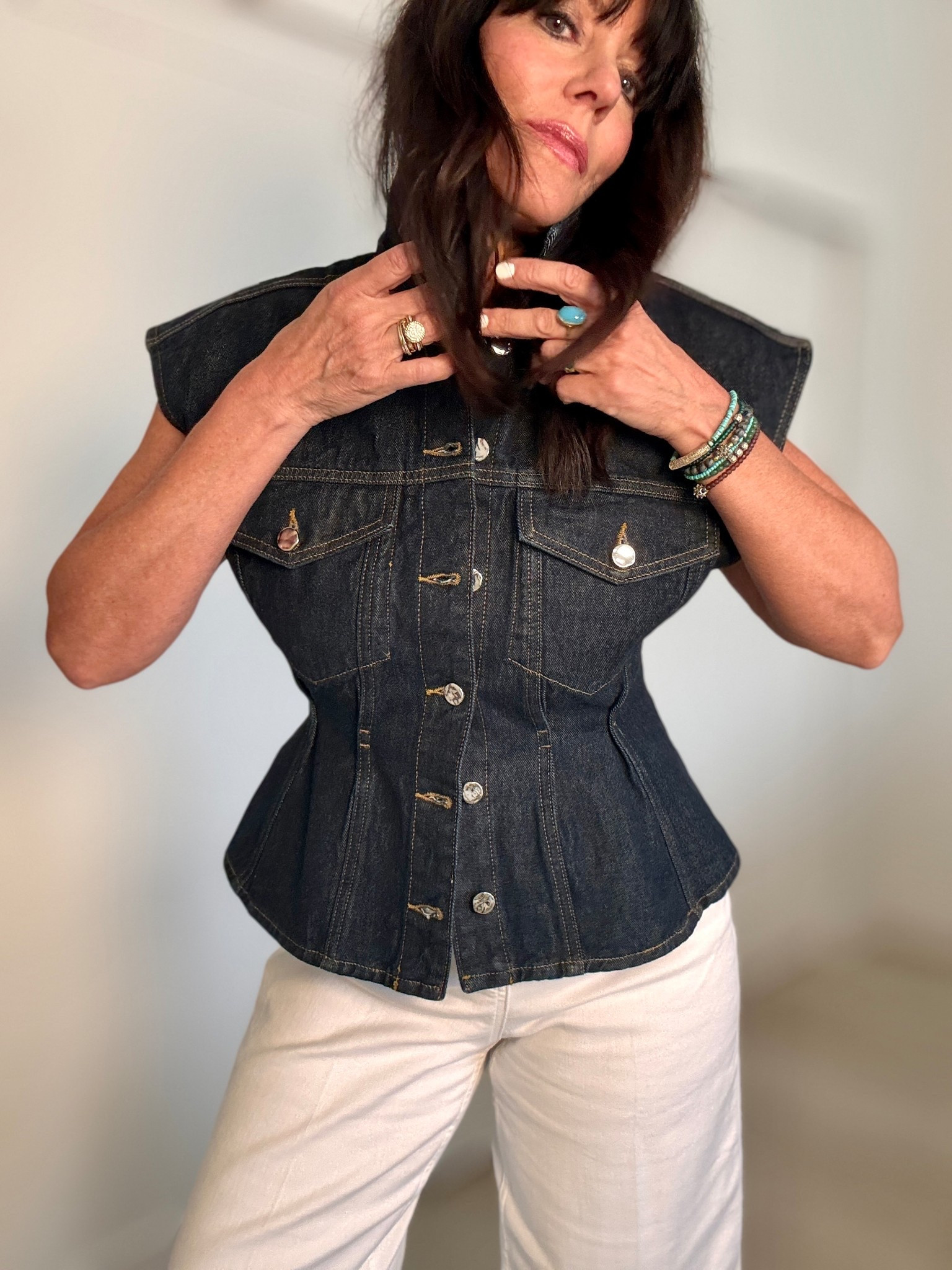 Winner of which outfit should I wear! 
This vest can be worn as a top like shown here - the buttons are a little tough to button but I’m sure it will get easier the more they are buttoned. 
Wearing size small top and size medium white Spanx jeans 
Coachella inspired boho platform sandals with ankle wrap TTS 
Lip color - liv it up 

#LTKFestival #LTKOver40 #LTKTravel