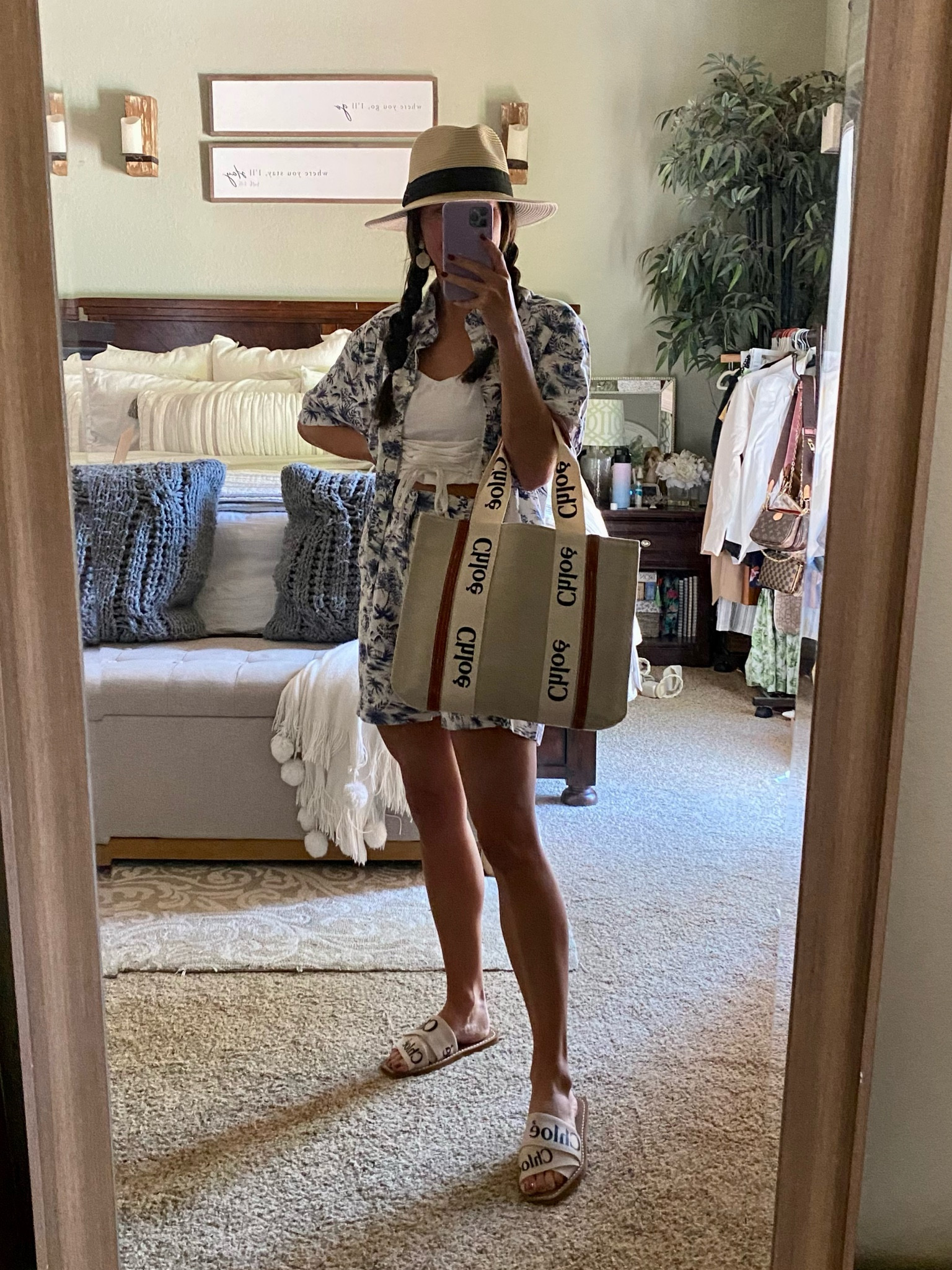 Beach vacation travel look Chloe slide sandals and tote bag Panama hat palm tree tailored shorts on sale

#LTKshoecrush #LTKtravel #LTKsalealert