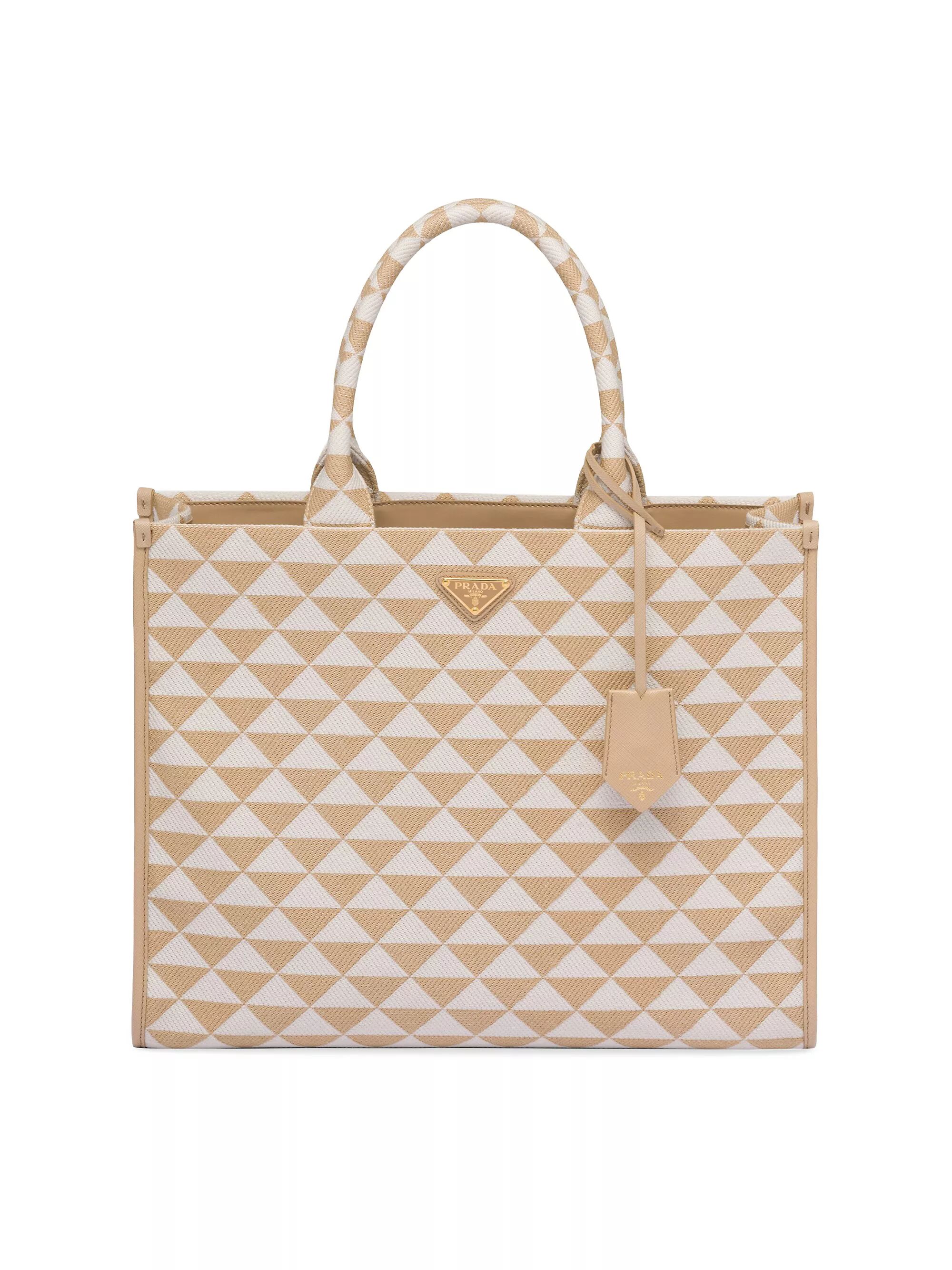 Shop By CategoryTotesPradaLarge Symbole Embroidered Fabric Handbag$3,500 | Saks Fifth Avenue