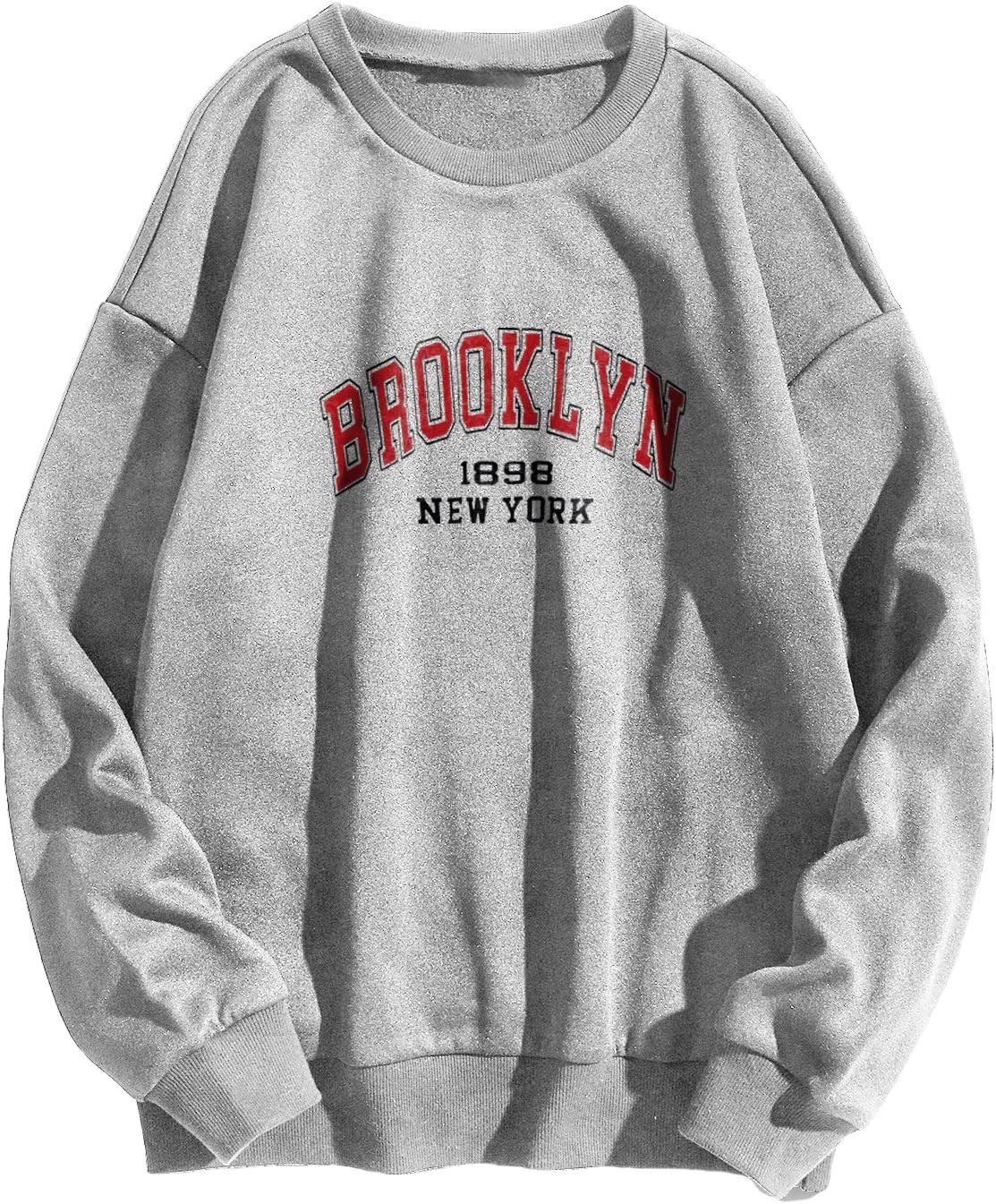 WDIRARA Women's Letter Graphic Print Round Neck Long Sleeve Sweatshirt Tops Pullovers | Amazon (US)