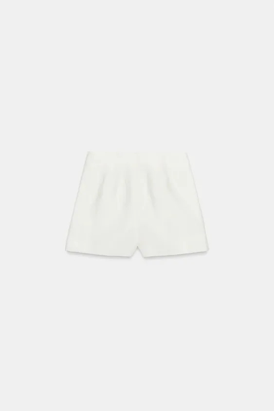 Model height: 181 cmMid-waist Bermuda shorts with front darts. Front fastening with matching cove... | Zara UK