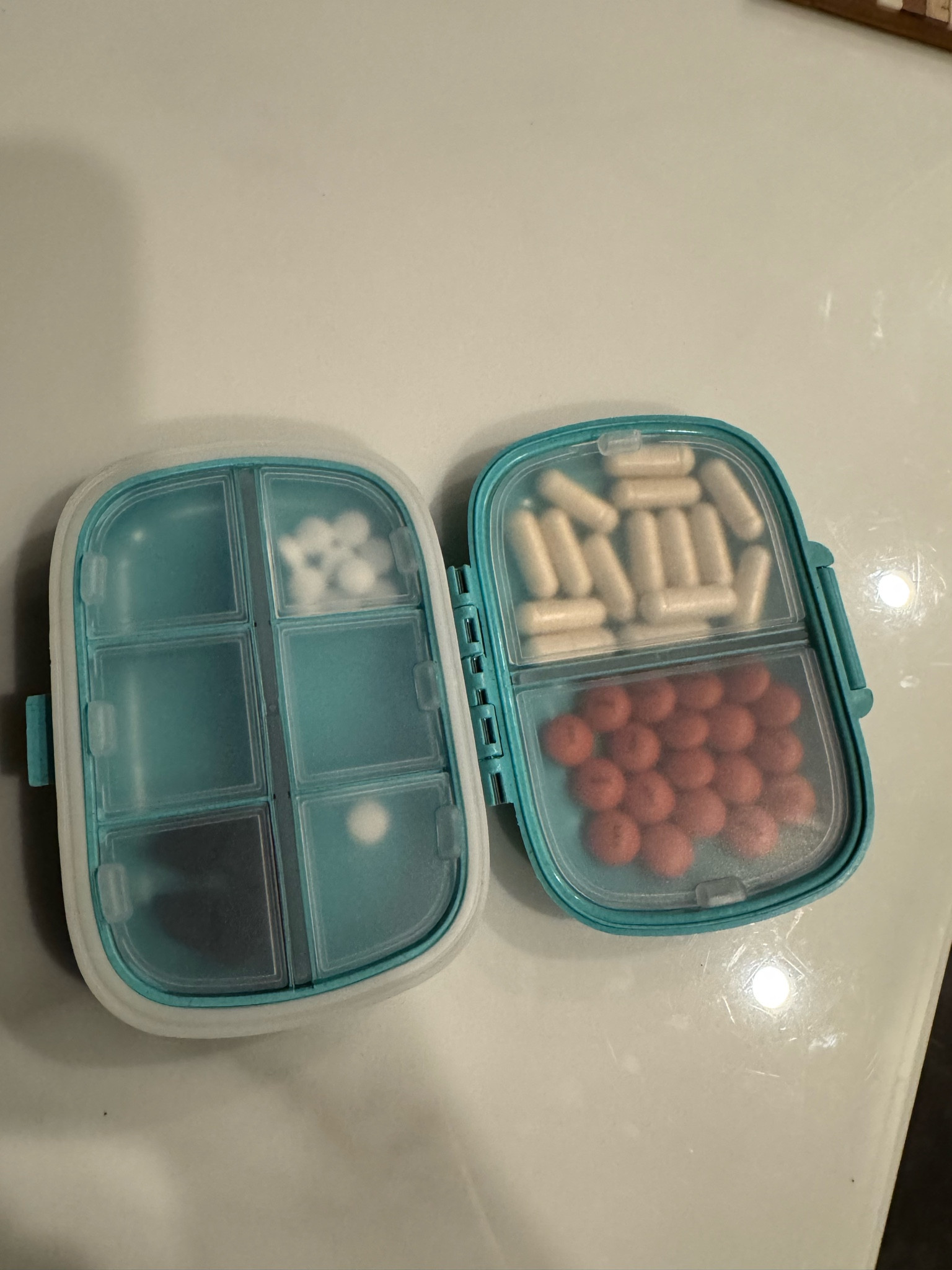 Travel essential: travel pill organizer. Keeps all my pills organized while I travel. 

#LTKTravel