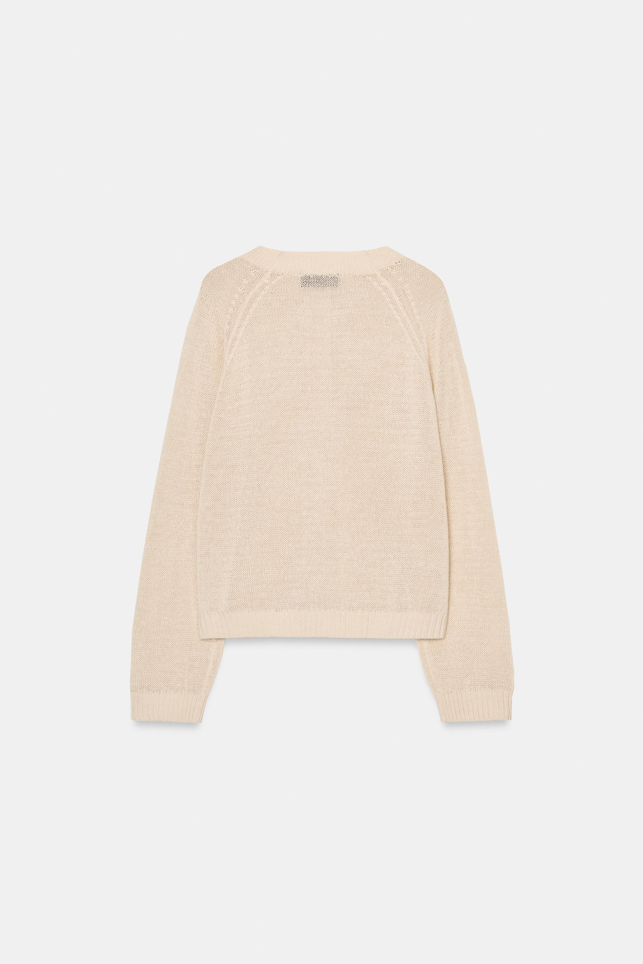 Long sleeve jumper with a round neckline. Front button fastening and ribbed trims. | Zara UK