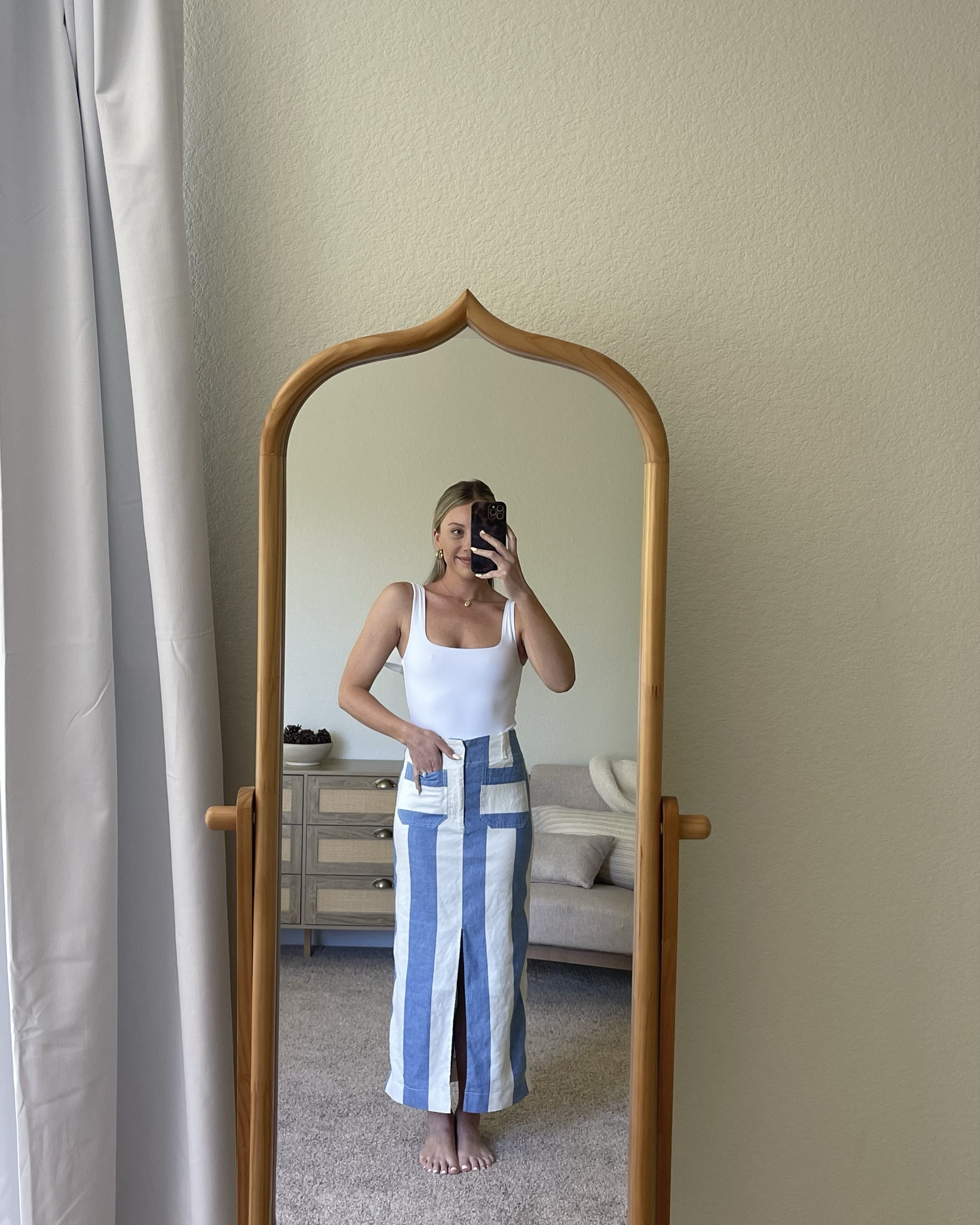 Currently obsessed with this skirt from Anthropologie 🩵🤍🩵 S - white tank. XS- skirt.
Size down in the skirt, I am usually a small. It’s stretchy too and I have room even tho I sized down!

#LTKStyleTip