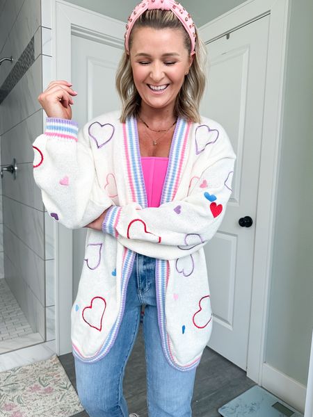 This Valentine’s Day cardigan from Amazon is too stinkin cute. I sized up but would much prefer my true size small. The stitched on hearts are just so cute! 

#LTKfindsunder50 #LTKfindsunder100 #LTKstyletip