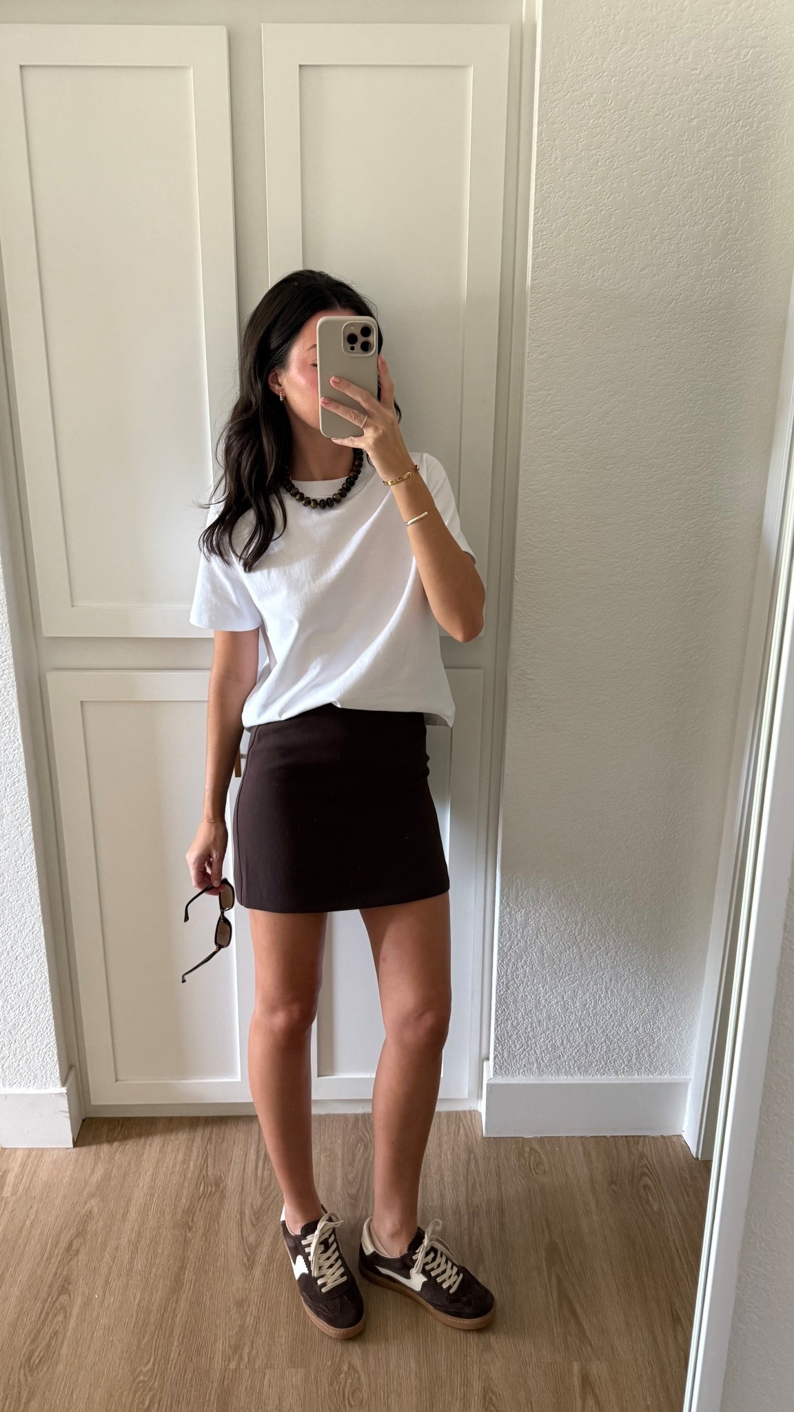 Ootd! This skirt is a great classic mini length, not as short as some of my others! 

I’m 5’7” wearing a 2/S in the brown skirt and XS in the white tshirt

#LTKFindsUnder100 #LTKSeasonal #LTKStyleTip