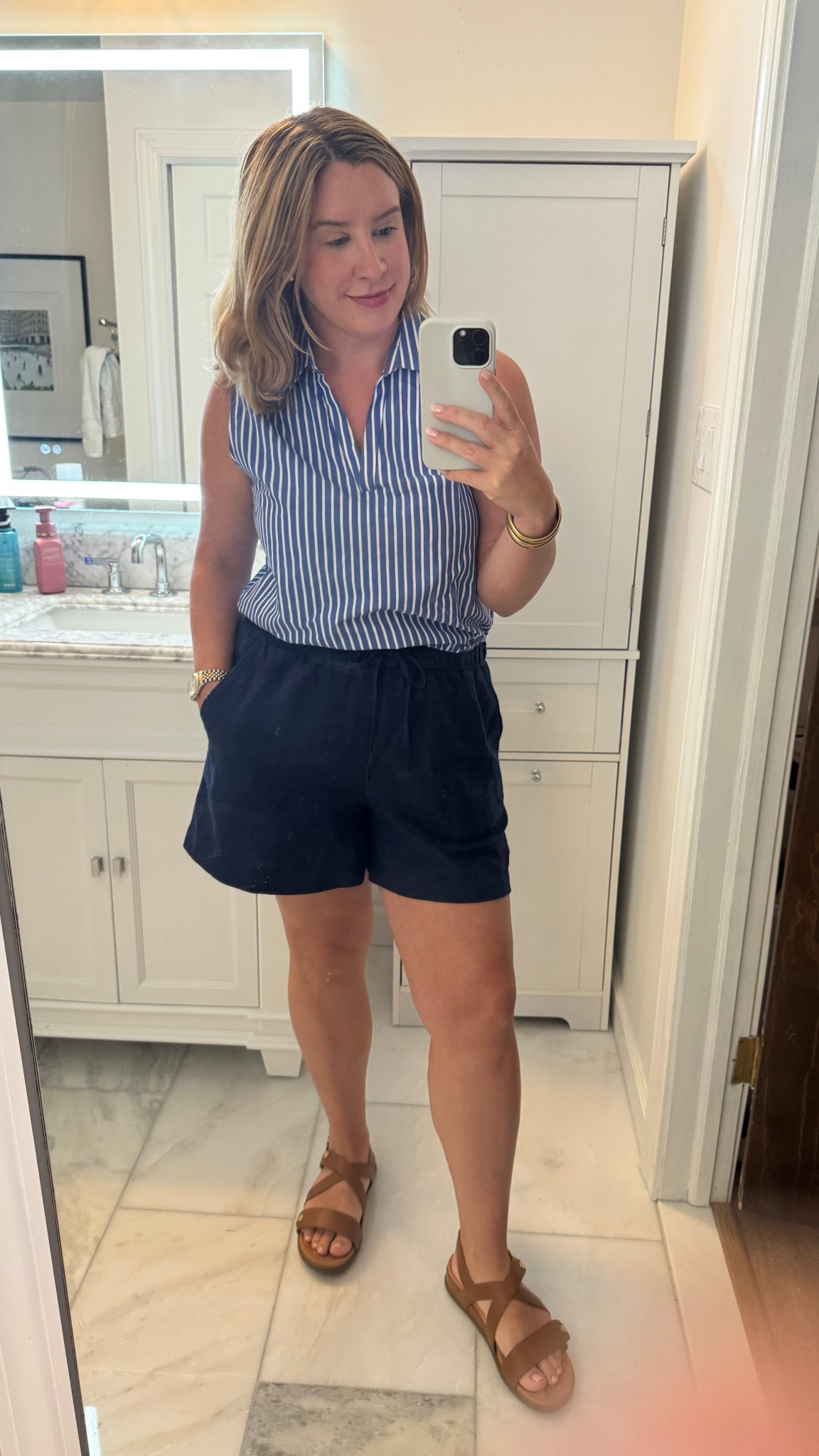 Vacation outfit, linen breezy shorts, striped top, walking sandals 

#LTKSaleAlert #LTKShoeCrush #LTKTravel