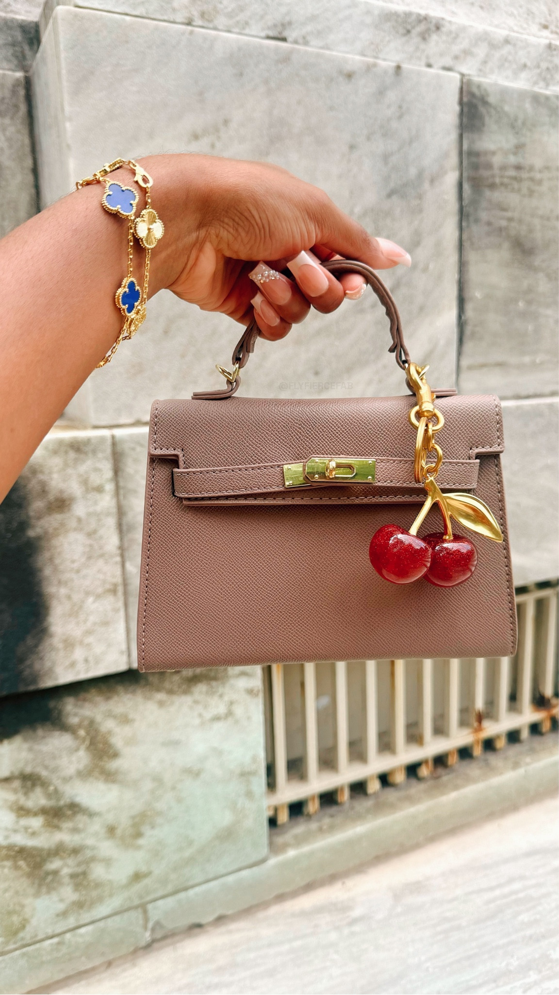 I got this designer inspired bag on Amazon for $25, and I can’t wait to style it with my fall outfits 😍✨.

It comes in a few different colors, and I got it in khaki since this neutral color will allow me to style it or a lot of different looks 🤎. It’s made of PU leather, and comes with a removable purse strap.

This is a great elevated everyday bag, and it’s big enough to fit your essential items inside. I love that it’s lightweight, so it doesn’t feel heavy when I’m carrying it. 

I got a $9 cherry purse charm from SHEIN 🍒 to give it a little flare. 

#LTKItBag #LTKFindsUnder50 #LTKSeasonal