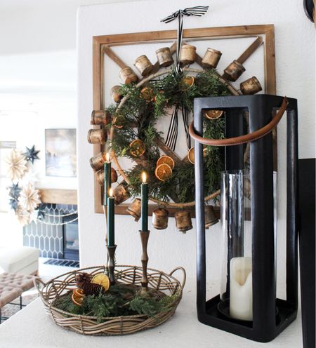 Neutral Christmas Decor.  I love the black, green and natural wood look.  I incorporated dried oranges for a splash of color. 

#LTKHoliday #LTKhome #LTKSeasonal