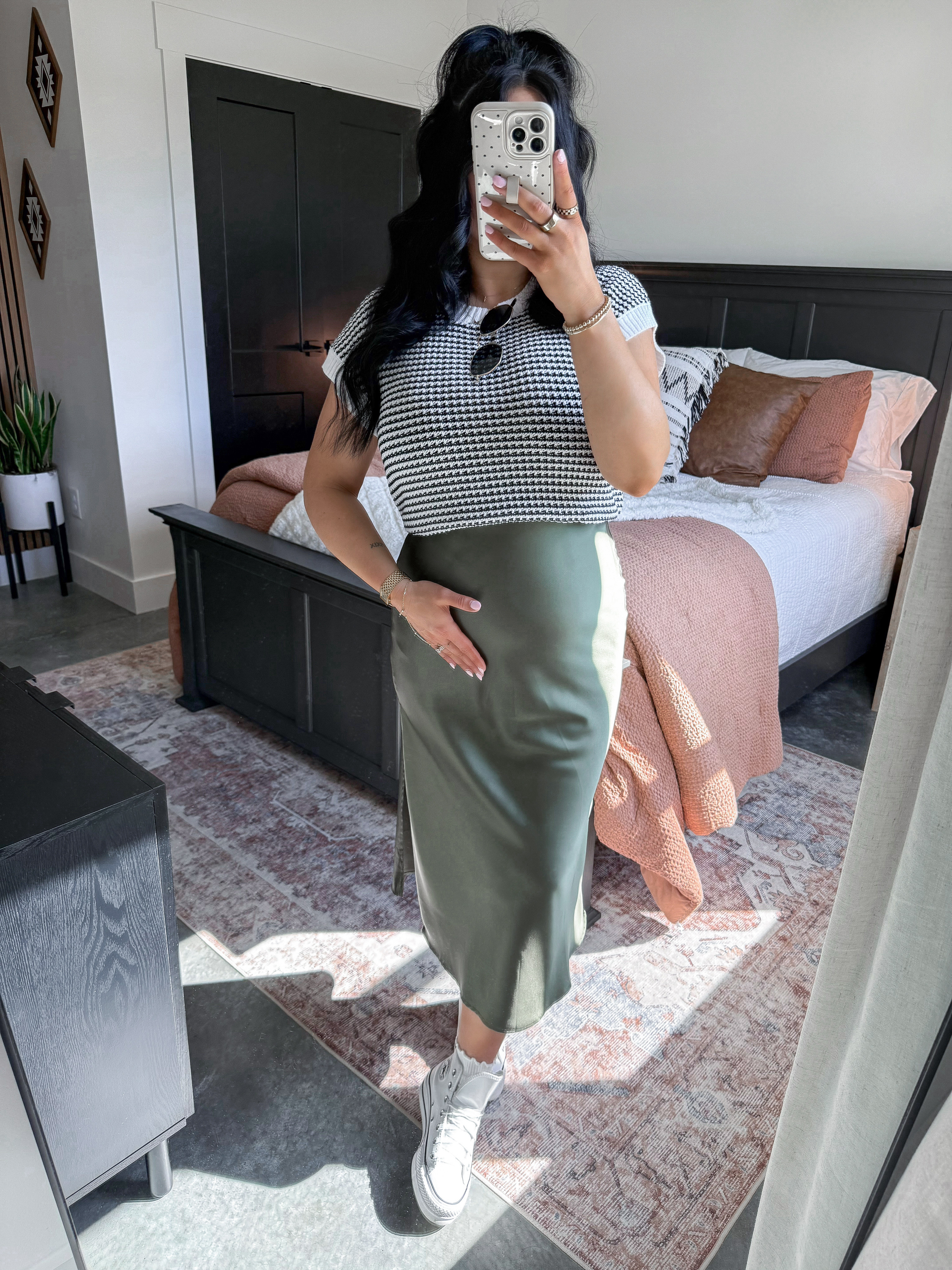 Bump Friendly Spring Outfit Idea 🤍🖤

Top - small (white option)
Bralette - medium
Skirt - small (army green option - currently 28+ weeks pregnant, & while the small does fit, I could've sized up one for more room in the hips!)

These satin skirts are a must have for me. 👏🏼 I have shared them in multiple colors - the quality is so good, I love the length AND they can easily be dressed up or down! They have an elastic waistband which makes them so comfortable (& easy to pull up right over the bump!) I paired it with this black and white knit short sleeve top (perfect piece to transition into spring & does come in other colors!) & finished the look with some cute white ruffle socks, my white leather platform converse & some amazon sunglasses! 

 

 #LTKgrwm #LTKootd #LTKBump