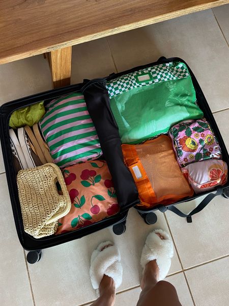 colorful packing cubes + travel organization makes me happy ☺️

I usually use the away bigger carry-on flex +  medium hue luggage for trips  

#LTKtravel #LTKfindsunder100 #LTKitbag