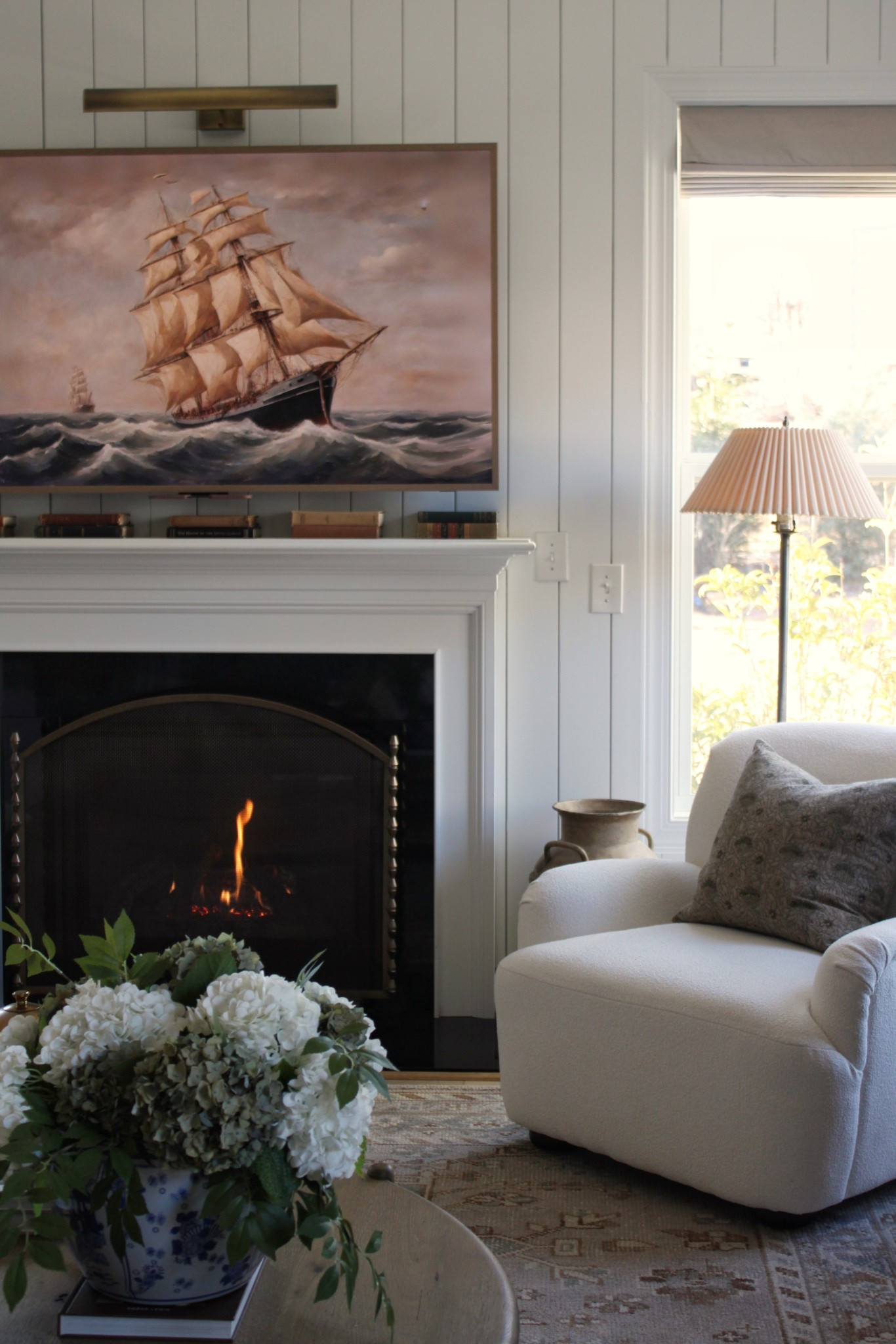 Living room corner, affordable accent chair, frame tv art