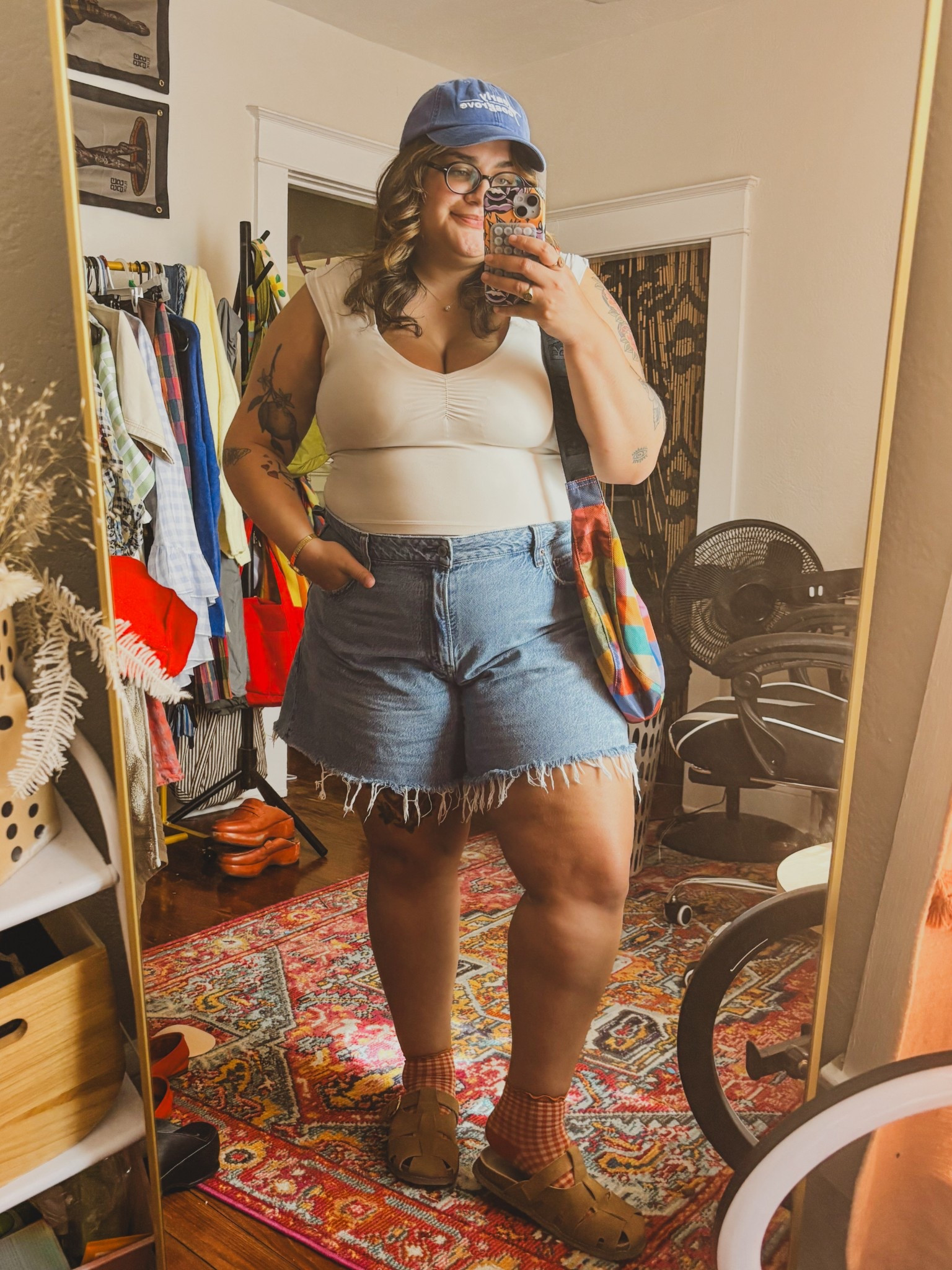 Casual summer outfit. This tank top is amazing with a built in bra (I am wearing XL). These shorts from Abercrombie are the best denim shorts I have ever tried (I sized up one from my usual size). They are curvelove so they are comfortable when sitting. These mules are great for summer styling. Madras Baggu UO exclusive is sold out but linking in case it returns

#LTKSaleAlert #LTKMidsize #LTKStyleTip