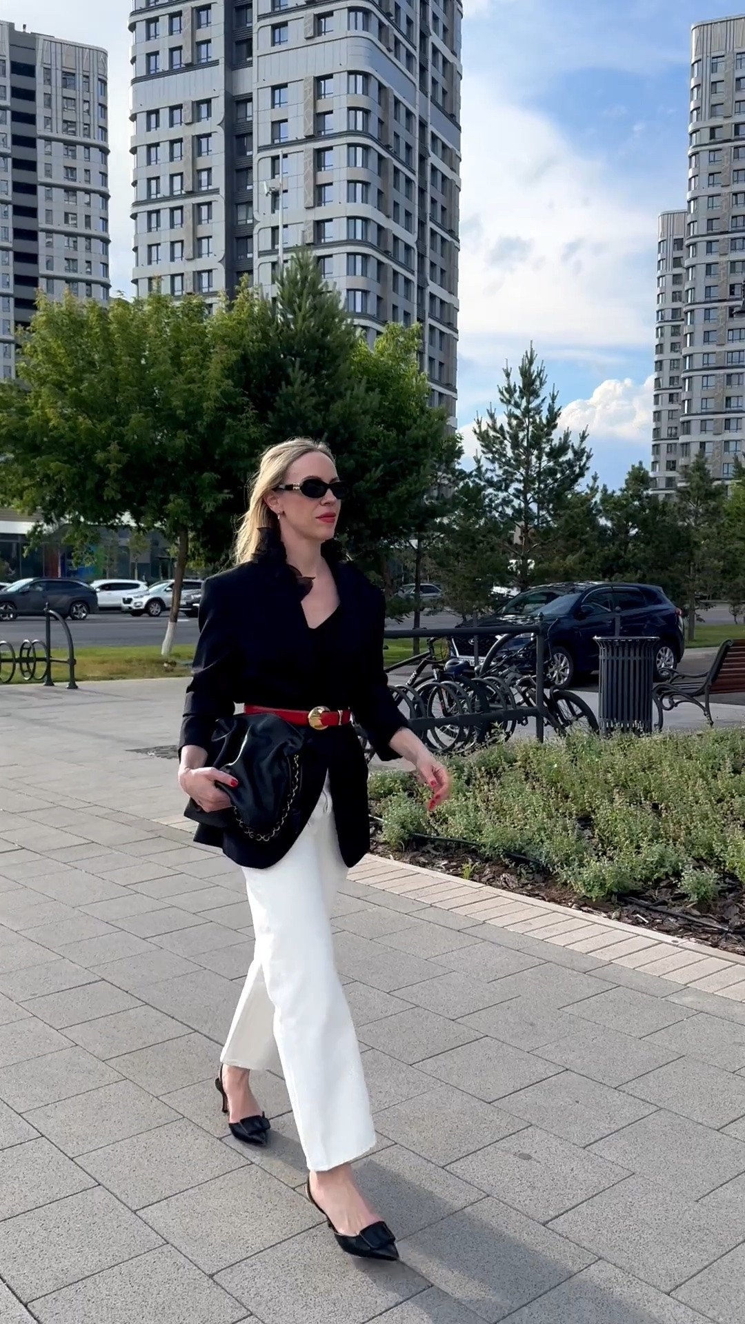 Date night outfit with oversized black blazer, @levi white baggy jeans, black point toe pumps, red waist belt

#LTKOver40 #LTKSeasonal #LTKSaleAlert
