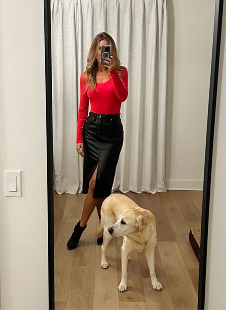 Christmas party outfit 
Red bodysuit 
Office wear 
Vegan leather maxi split skirt 
Black booties 

#LTKHoliday #LTKfindsunder50