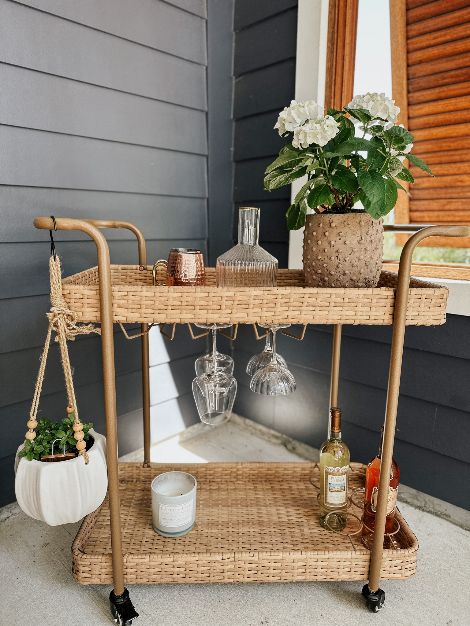 This rolling bar cart is perfect for outdoors! #homedecor, #entertaining, #springdecor, #springhome 

#LTKhome #LTKstyletip #LTKSeasonal