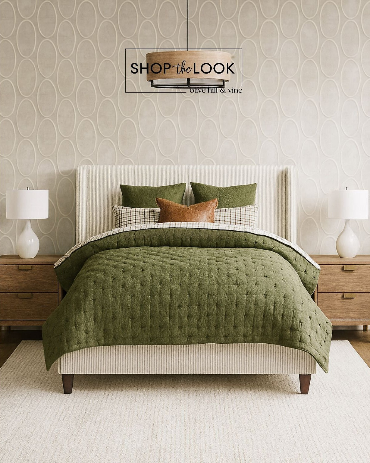A layered mix of texture and tone—deep green linen, ribbed corduroy, and soft sand wood create an inviting balance. Mid-century nightstands, a modern wingback bed, and a rustic drum chandelier complete this timeless, nature-inspired bedroom design. 

 

#LTKHome #LTKStyleTip #LTKFamily