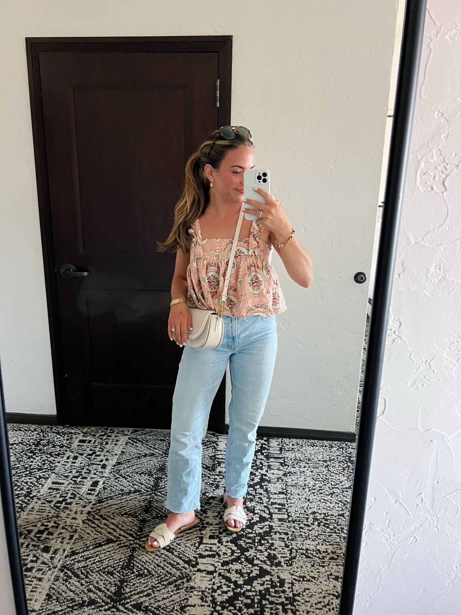 This exact shirt is sold out but it’s on nuuly — selkie ruffled apron top! 

zara purse:  6011/210