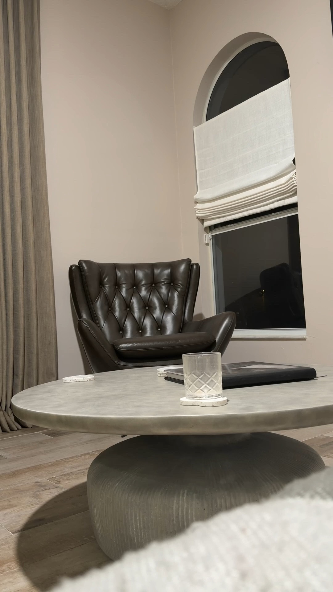 Loving how this space is turning out 🤗 The paint color is Sherwin Williams’ Touch of Sand. Roman shades are Bleached Linen from Select Blinds. Curtains are Liz Linen Taupe Gray from Two Pages Curtains. Chair is Pottery Barn Burnished Wolf Gray. This #coffeetable can be used indoor or outdoor!

#interiordesign #homedecor #home

#LTKSaleAlert #LTKHome #LTKdayinmylife