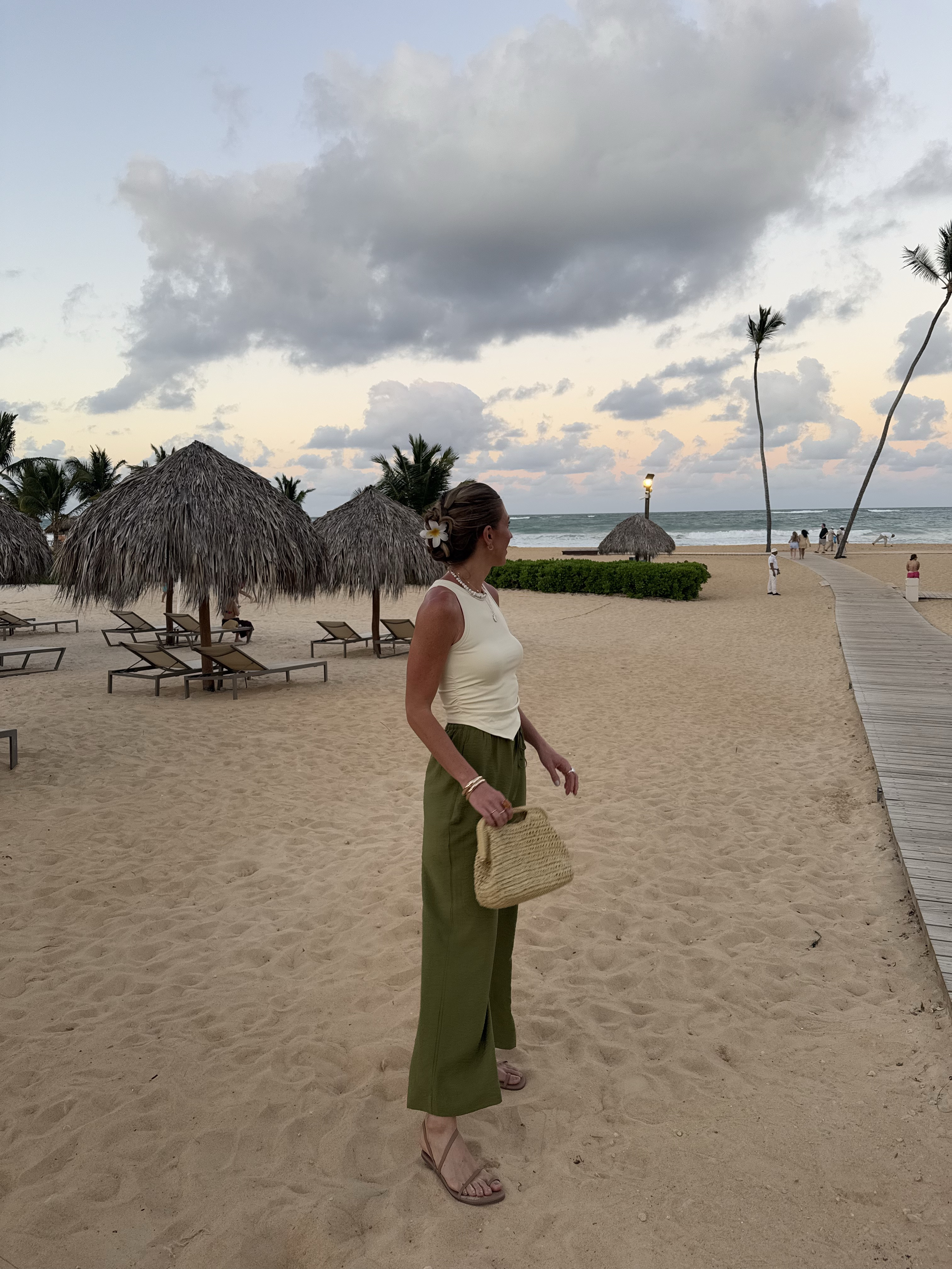 Small in top and small regular in pants to wear high waisted and at a cropped length 