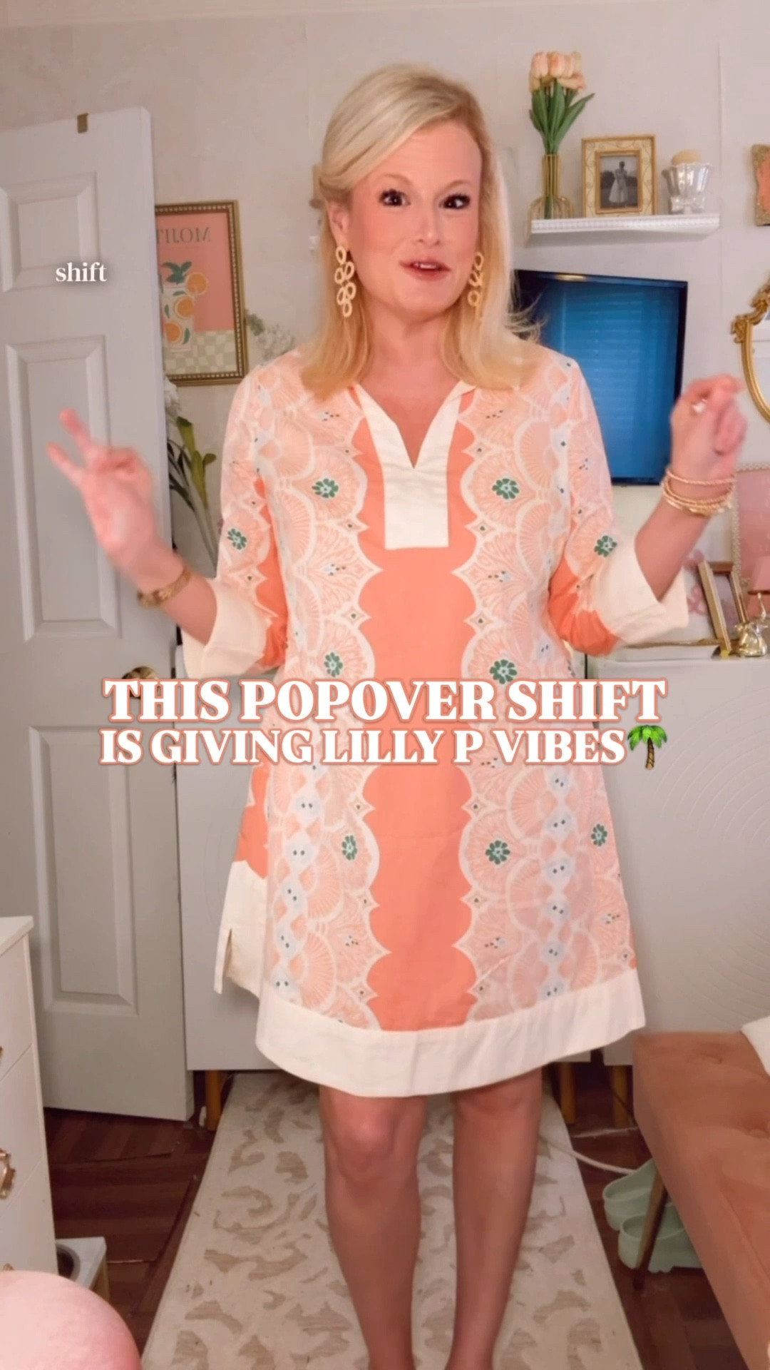 Lilly Pulitzer look for less | popover dress women | preppy spring dress | coral shift dress women | Palm Beach style dress | vacation dress women | spring outfit women | Belk dress finds

This dress is pure polished spring and summer energy.

The coral and white color story. The popover shift silhouette. The scalloped lace-inspired print placement. It has that bright, feminine, Palm Beach feel that reads expensive the second you put it on.

I’m in a medium. True to size with an easy fit.

It is 100% cotton, 34 inches long, and one of those dresses that works for so much of real life. Vacation, brunch, bridal showers, baby showers, spring workdays, dinners, and all the moments when you want to look pulled together l  

There is also a blouse version, and right now it is buy 1 get 2 free, which makes this an especially good time to grab it.

This is the dress for:
• spring dresses women
• preppy spring outfits
• vacation outfits women
• resort wear women
• work dress women
• Palm Beach style
• polished everyday spring style

It gives that “she always finds the good ones” energy.

popover dress women, lilly pulitzer look for less, lilly inspired dress, preppy spring dress women, coral shift dress women, spring dresses women, vacation dress women, resort dress women, palm beach style dress, shift dress women, preppy dress women, work dress women, brunch outfit women, bridal shower dress women, baby shower dress women, country club style dress, crown and ivy dress, belk dress finds, polished spring outfit women

#LTKFindsUnder100 #SpringDresses #PreppyStyle #LillyPulitzer #PopoverDress #ShiftDress #BelkFinds 

#LTKTravel #LTKWorkwear #LTKSaleAlert