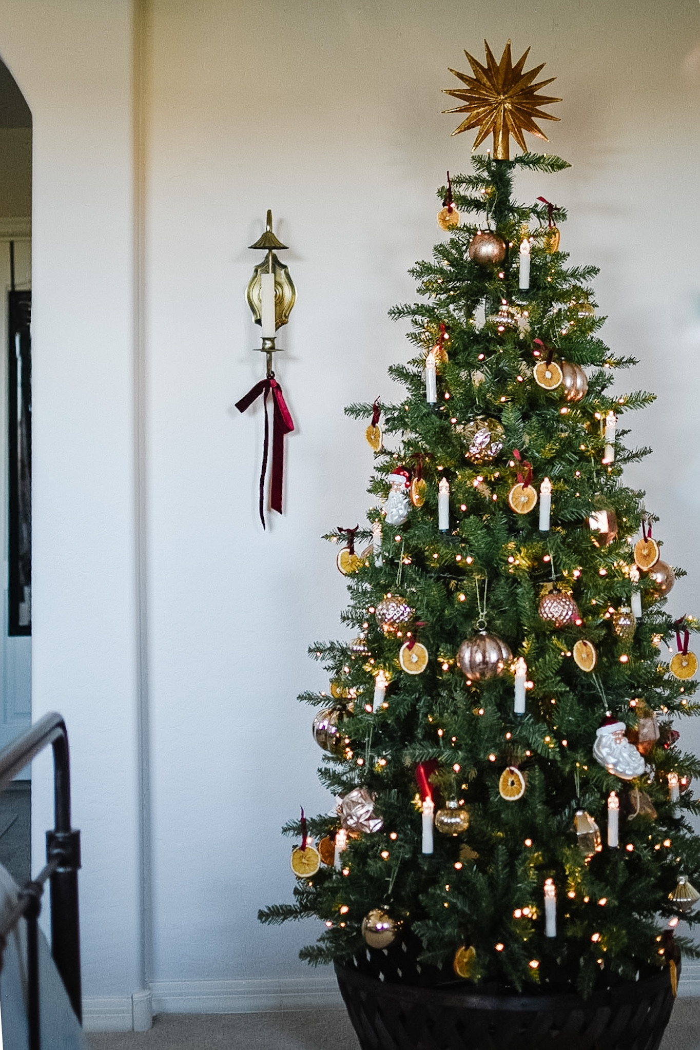 I love the way these dried orange slices (tied with my favorite velvet ribbon) and the candles (a great dupe!) made this tree feel so nostalgic and Victorian. This @kingofchristmas tree played its part perfectly as it reminds me of the fresh-cut trees we used to chop down when I was little. Just looking at it brings back memories of that fresh pine scent. I’m thinking I may still add some tinsel. What do you think?
#kingofchristmas #kingofchristmastree

#LTKSeasonal #LTKhome #LTKHoliday