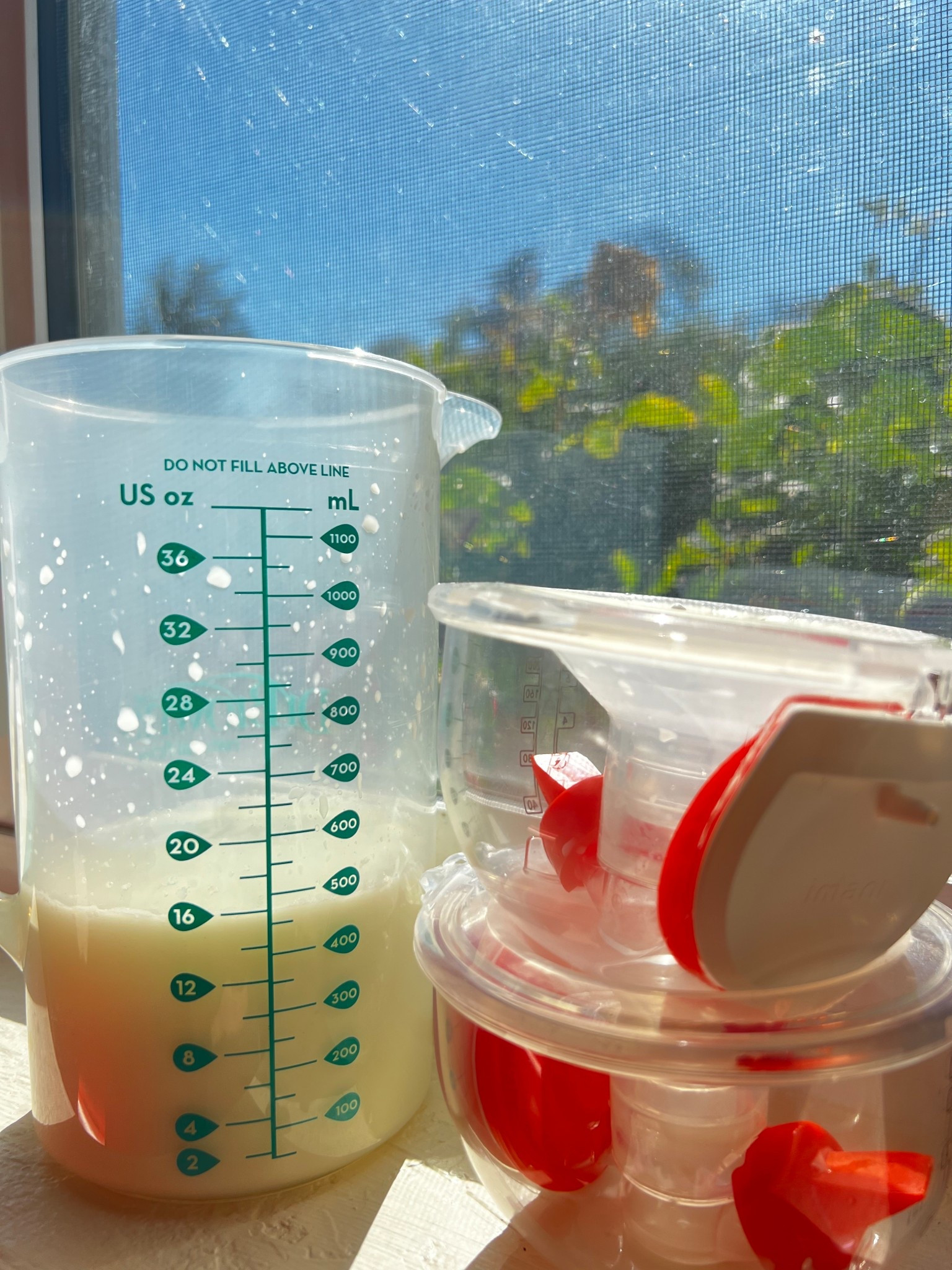 I don’t think I’ve ever felt so much relief from one pumping session 😮‍💨😮‍💨🍼 the ladies were putting in the work!! I love these collection cups! #pumpingmom #breastfeeding 