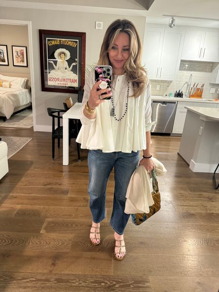 One of my go-to outfit combinations or “formulas” is a white top and denim. The way it becomes different and interesting is by varying the shape of the pieces. And of course the shoes and accessories. This top is probably 10+ years old. I love it and will never give it away. However, the look is unique and not for everyone. It’s very full and pleated (and needs a very good dry cleaner to get it right). IMO these details make it kind of funky and cool while still keeping with my overall classic style. 

#LTKSeasonal #LTKshoecrush #LTKstyletip