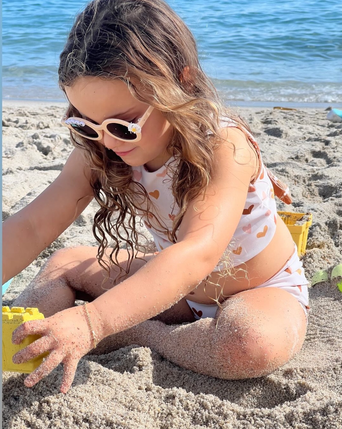 Woke up to photos of my nieces enjoying their #christmasgifts from auntie 💕 These #swimsuits are reversible with butterflies on the other side, the #sunglasses say their names, and I just love the #beachumbrella! 

#funinthesun #kiddieswimsuits #swimsuitsforgirls #beachday #beachblanket #giftsforkids #kids

#LTKSeasonal #LTKGiftGuide #LTKKids