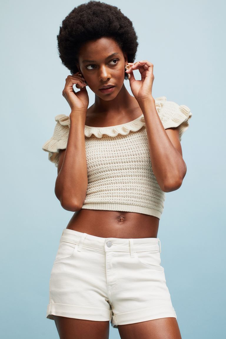 Conscious choice  Fitted, crochet-look knit crop top. Wide, square, flounce-trimmed neckline, sho... | H&M (US + CA)