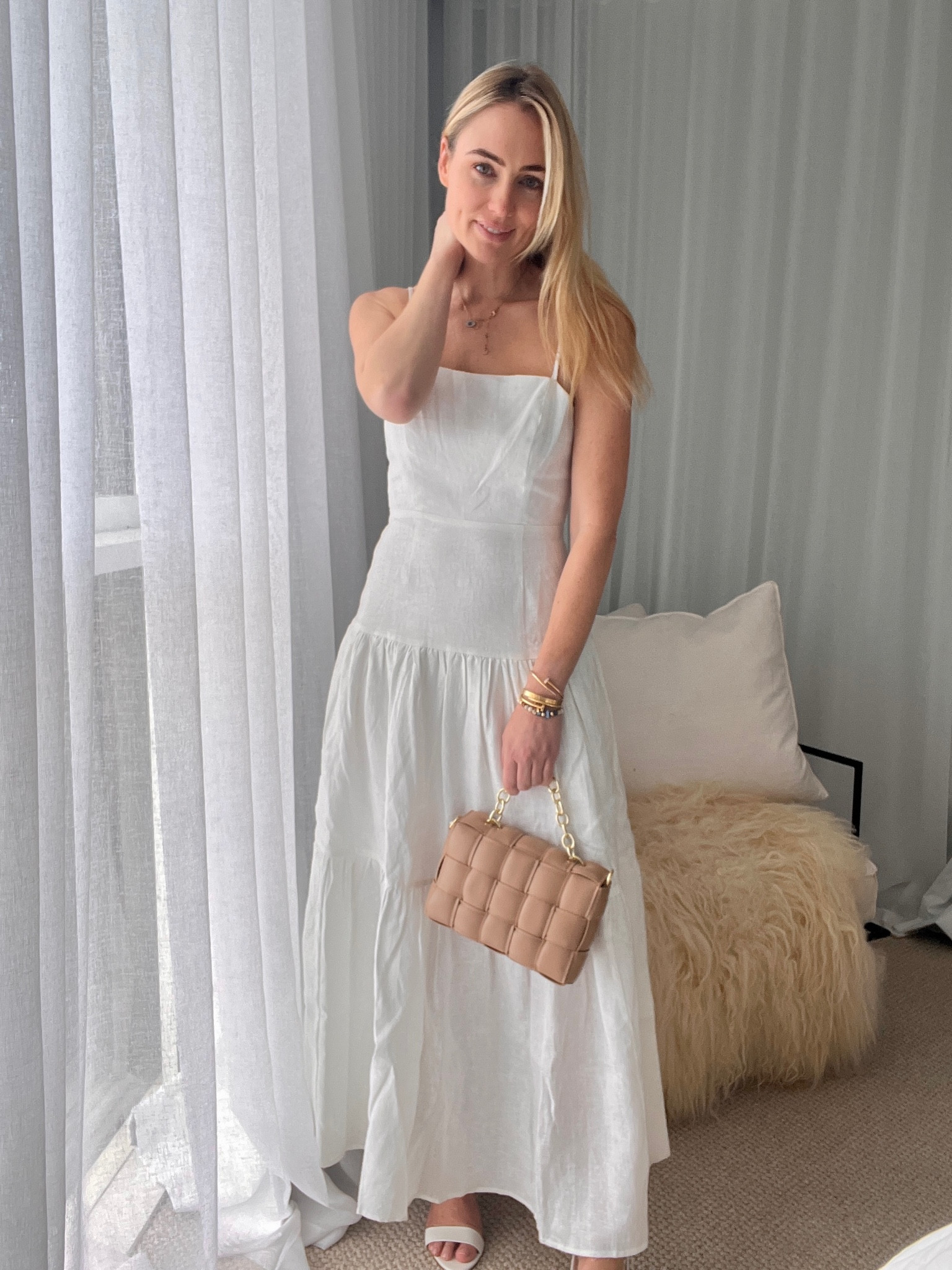Nothing says celebrating summer more than a classic white linen dress and tan purse! Dress down with a tan slide or up with a white sling back! 🤍 So chic! 

#LTKSeasonal #LTKunder100 #LTKaustralia