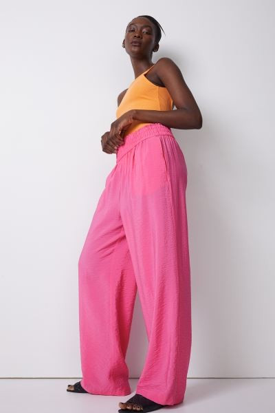 New Arrival
	Trousers in a woven viscose blend. High waist with elasticated smocking, pockets in ... | H&M (UK, MY, IN, SG, PH, TW, HK)