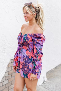 A New Look Purple Floral Printed Smocked Bust Long Sleeve Romper | Pink Lily
