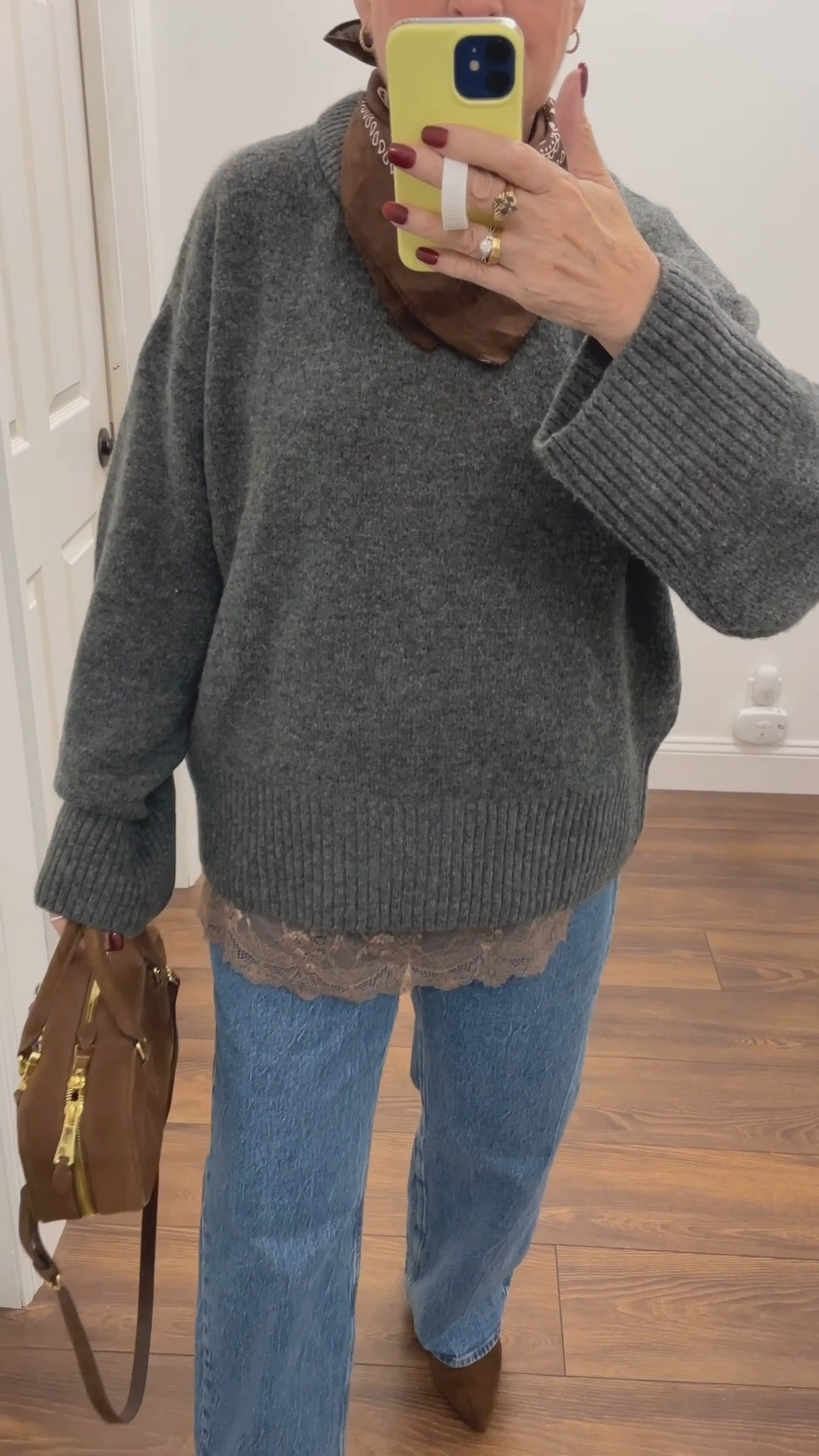 A simple jeans and sweater can be elevated by adding one or two points of interest. Here I added a triangle scarf and a lace cami peaking out under the jumper .  Your point of interest can be a simple neck scarf or a shirt tied around the waist. It adds a layer of visual interest that elevates your everyday look. 

Save this tip and give it a try! 

#fashiontips #womenover40 

#LTKOver40