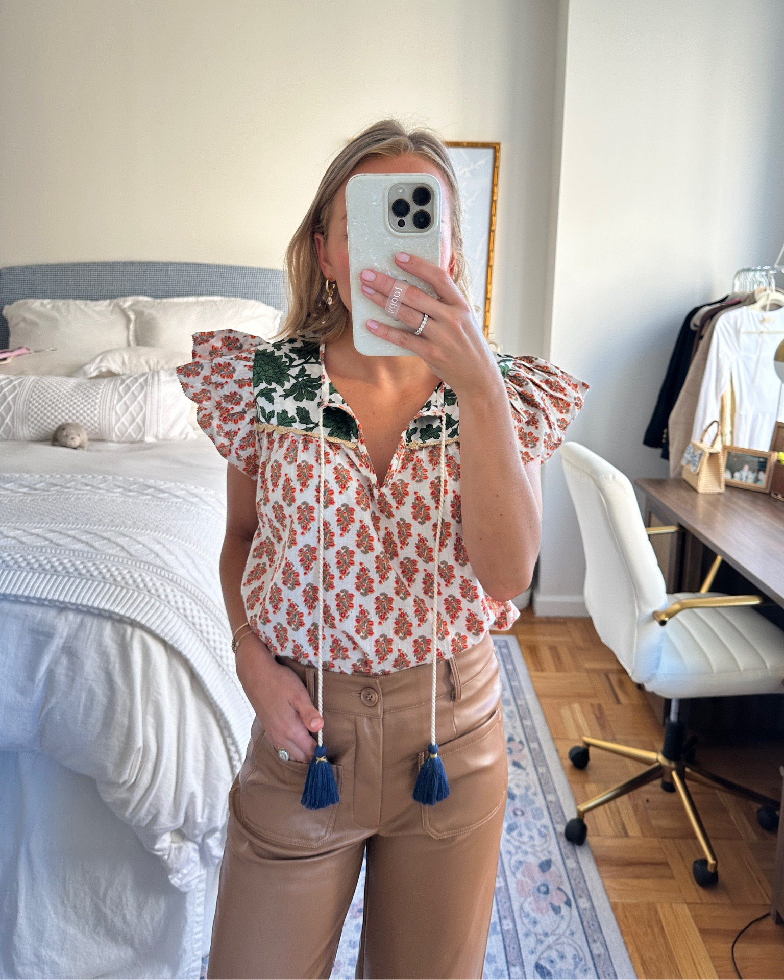 Prettied block print ruffle top and faux leather pants! Code: AMY15 Both are true to size 🧡 #fallstyle #fauxleatherpants 

#LTKHalloween #LTKfindsunder100 #LTKSeasonal