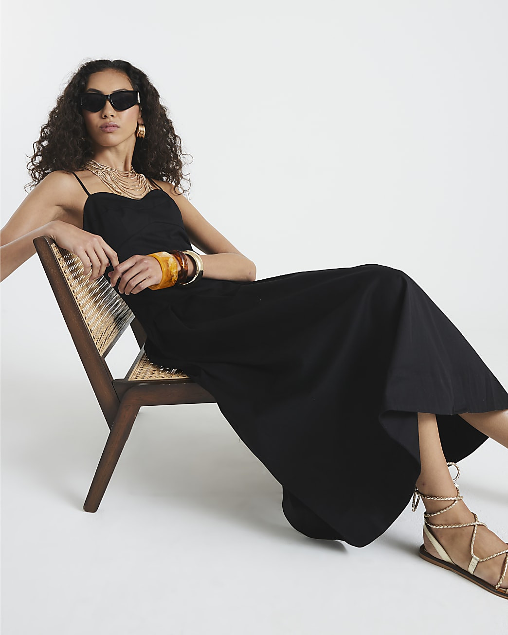 Black Sleeveless Strappy Corset Midi Dress | River Island UK & IE