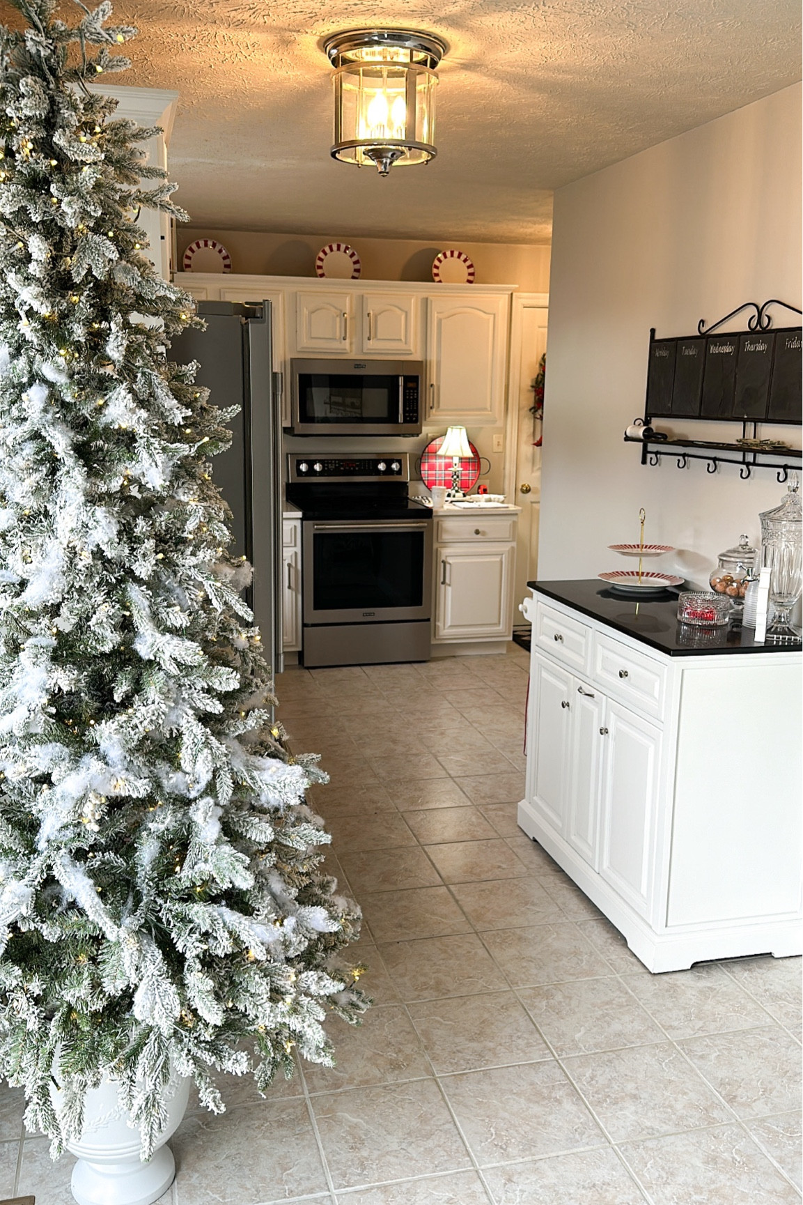 Slim flocked artificial Christmas tree.
King of Christmas 

#LTKSaleAlert #LTKHoliday #LTKHome