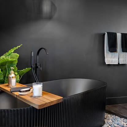 Master Bathtub Moment 🖤🌿

A statement soaking tub that turns this master bathroom into a true retreat. The sleek design paired with warm wood accents and organic textures creates a space that feels both modern and calming. It’s the perfect place to slow down, relax, and unwind at the end of the day.

Every detail was intentionally chosen to bring balance, warmth, and a spa like atmosphere to this beautiful master bath.

Designer: @design_by_rania 

 #LTKHome