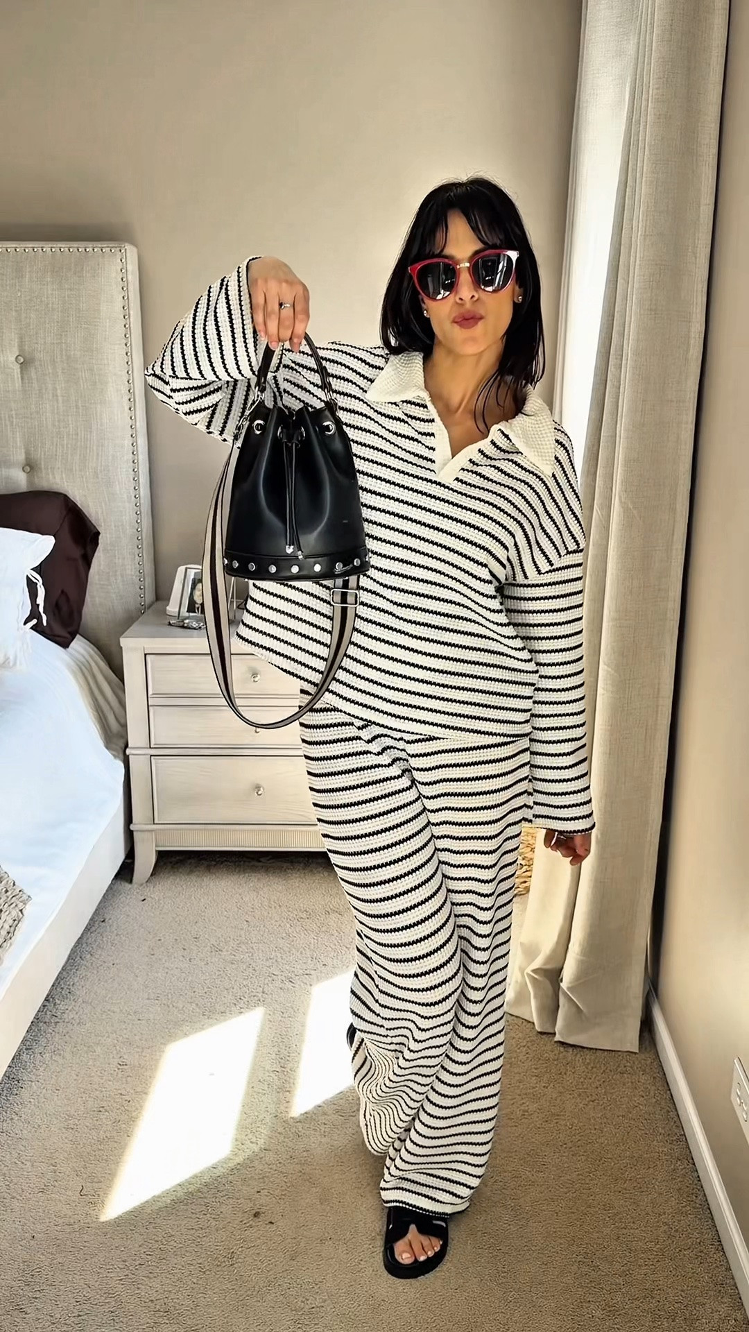 The easiest summer mom outfit you'll wear on repeat ☀️🤍

I'm loving this black and white striped long sleeve top paired with comfy black pants and simple H&M sandals. It's lightweight, effortless, and perfect for school drop-offs, running errands, coffee dates, or casual weekends.

✨ Summer mom outfit
✨ Black and white striped top
✨ Casual everyday style
✨ Comfortable mom fashion
✨ H&M sandals
✨ Capsule wardrobe essentials
✨ Neutral outfit inspiration
✨ Chic casual look

#LTKStyle #LTKFinds #SummerStyle #MomStyle #CasualOutfit #EverydayFashion #NeutralStyle #CapsuleWardrobe #StripedTop #HMStyle #ComfyChic #WeekendStyle #MinimalStyle