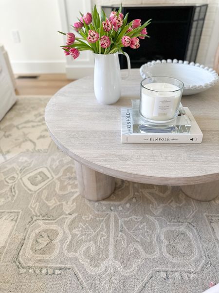 Neutral beige and ivory area rug, white washed round coffee table, coffee table decor 

#LTKhome #LTKsalealert #LTKstyletip