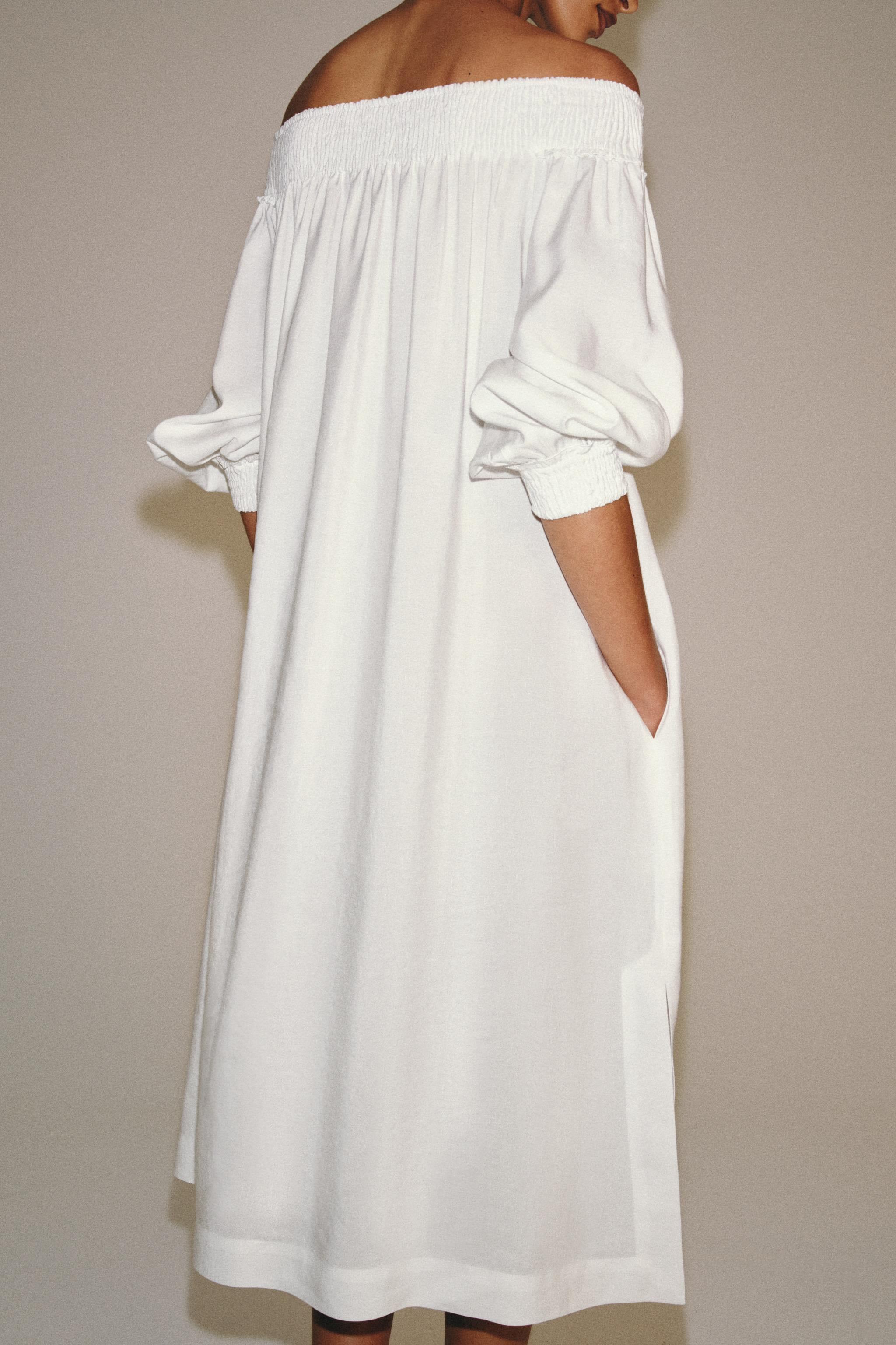 ZARA WOMAN COLLECTIONMidi dress made with 25% linen yarn. Straight neckline and long sleeves with... | Zara US