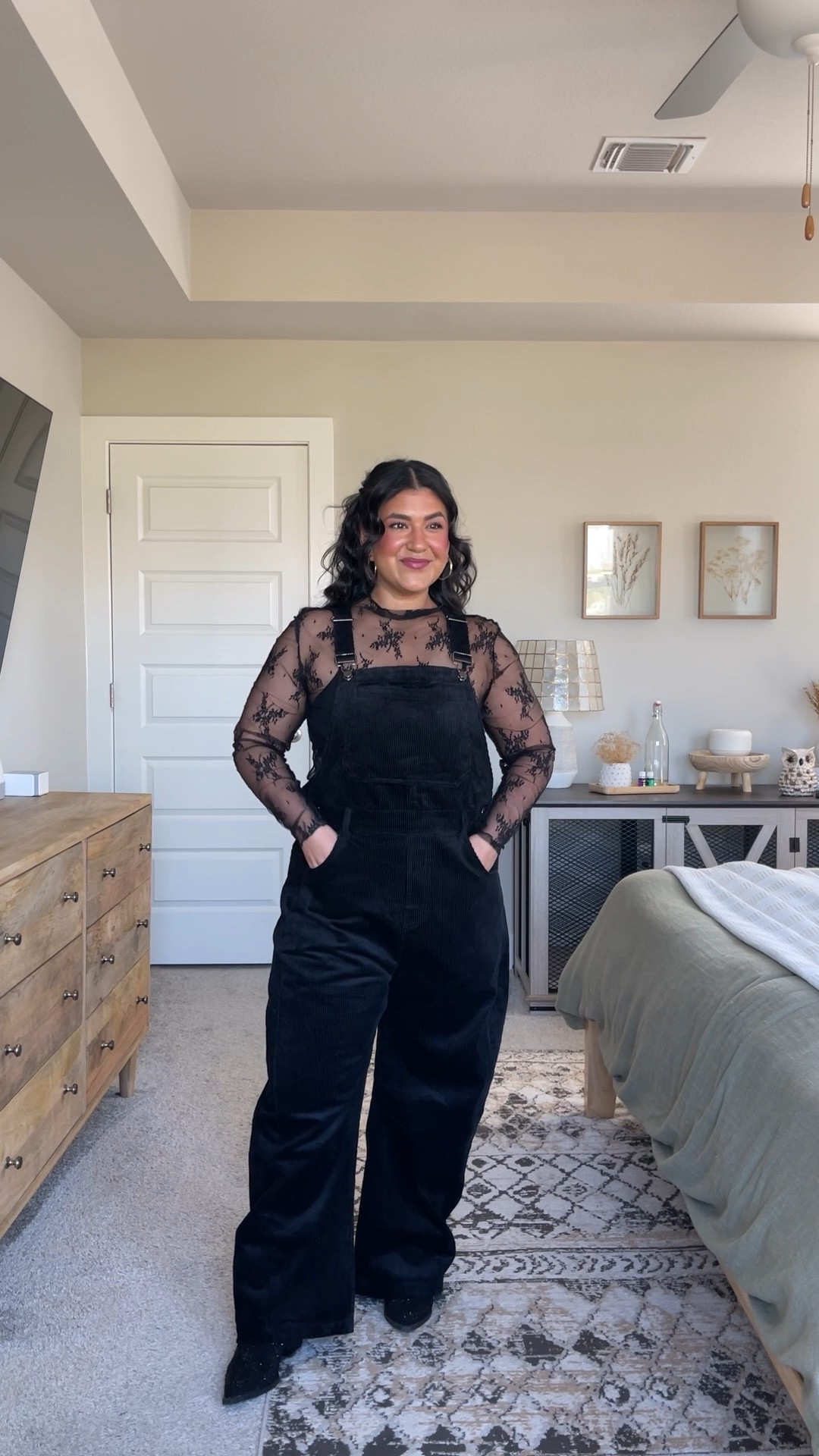 I’m 5’1”, size 10-12. CORDUROY OVERALLS: size large, these have a barrel jean fit but aren’t TOO barrely lol. Super comfy! 
LACE TOP: size large, not itchy at all. Love this for layering or wearing on its own with a black bra underneath. 
BOOTS: true to size, these are old but I found an exact pair at DSW, so I linked those! 
CAMI BRA: size up one, comes in a pack of 3! My absolute favorite. 
WHITE LOUNGE PANTS: size up, I wear the XL. Another favorite of mine that I have in 6 colors. 

#LTKHalloween #LTKVideo #LTKMidsize